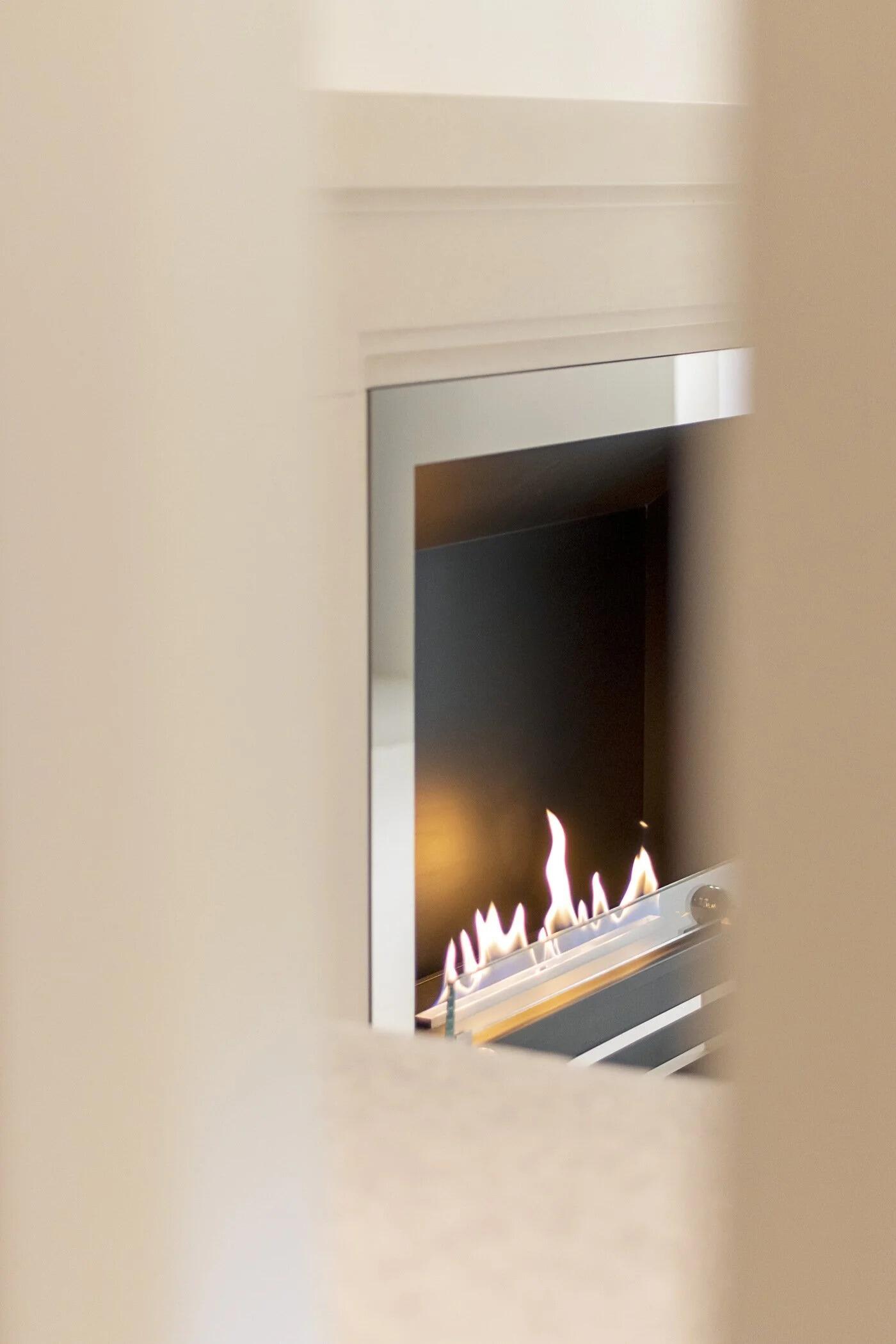 Close-up of the Westminster brushed steel insert with flames