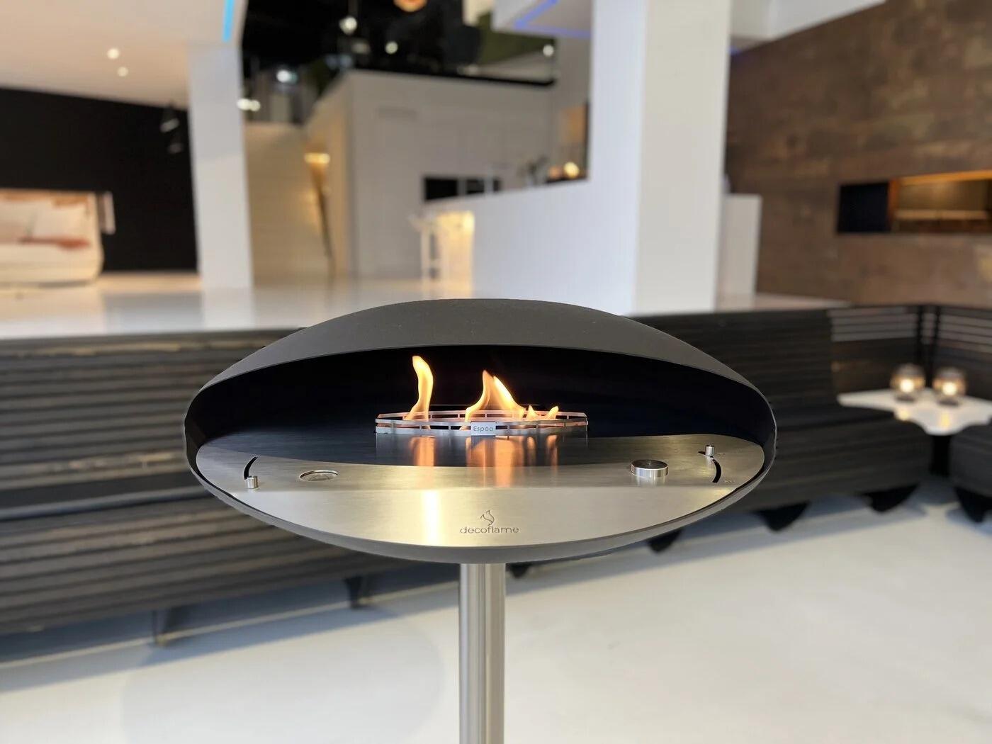 Espoo floor-standing fire on a steel foot in a showroom