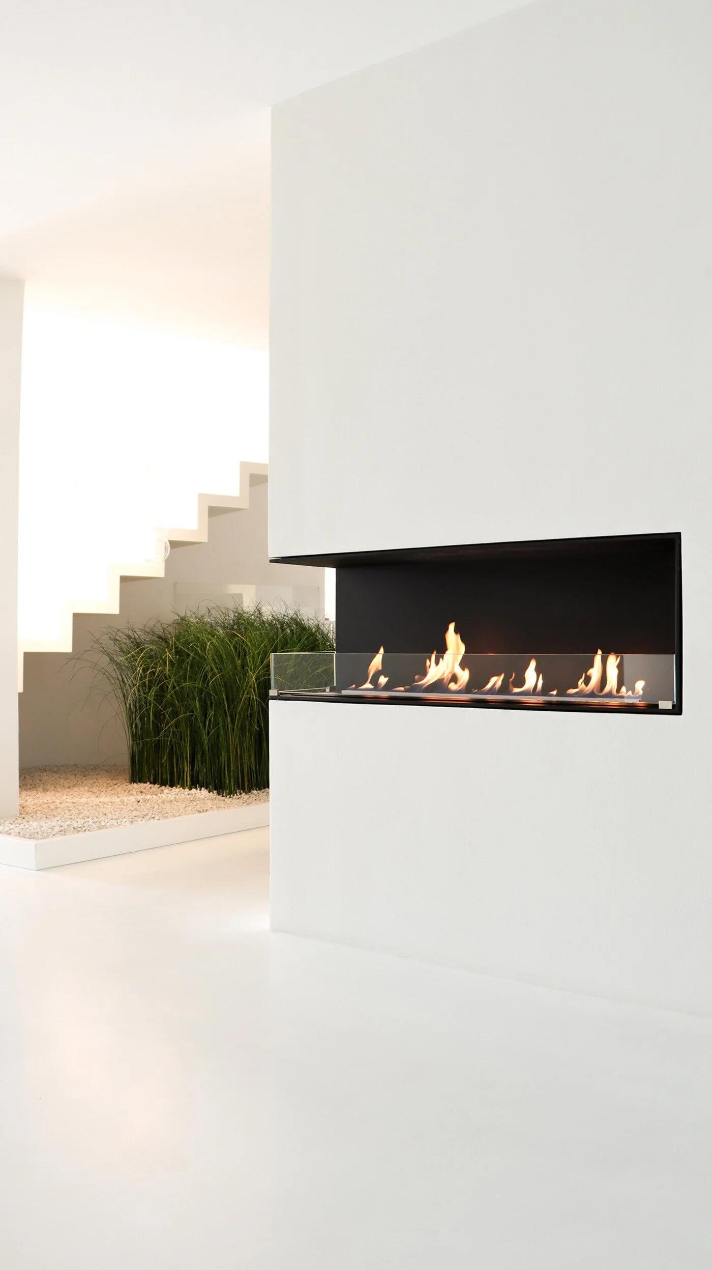 Montreal corner fire in a tall white wall in a bright hallway