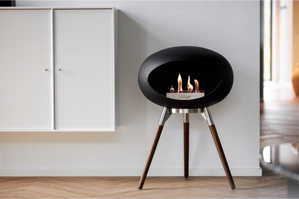 Le Feu Dome Wood Low bio-ethanol fire in black in a living room