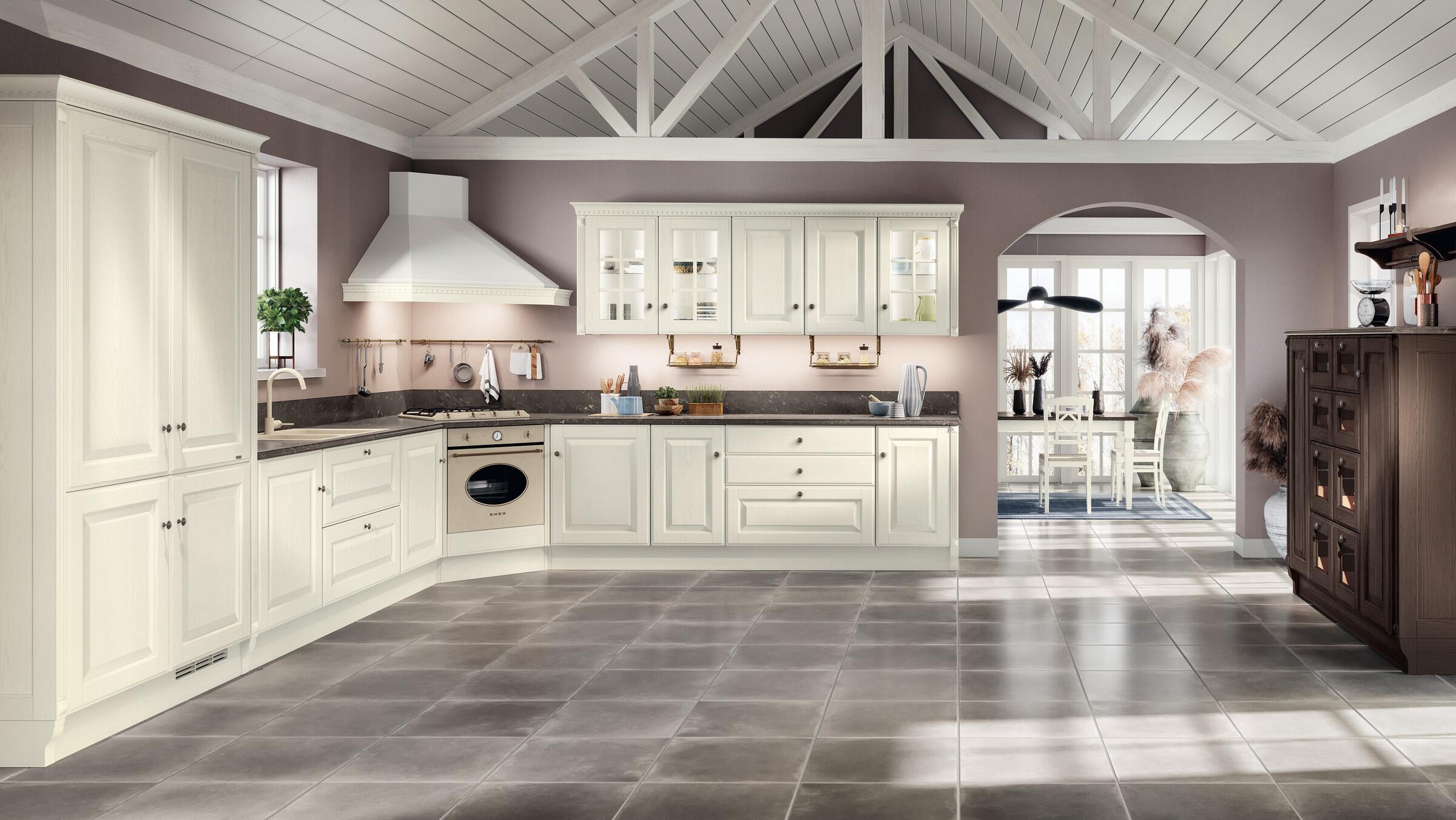 Scavolini Baltimora kitchen in cream with a vaulted ceiling, tall dresser units and a classic hood