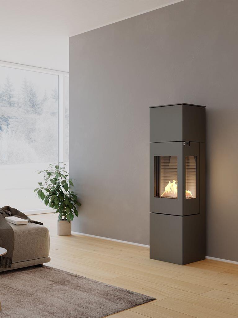 Rais Nexo 160 Bio bioethanol stove in a grey finish against a taupe wall