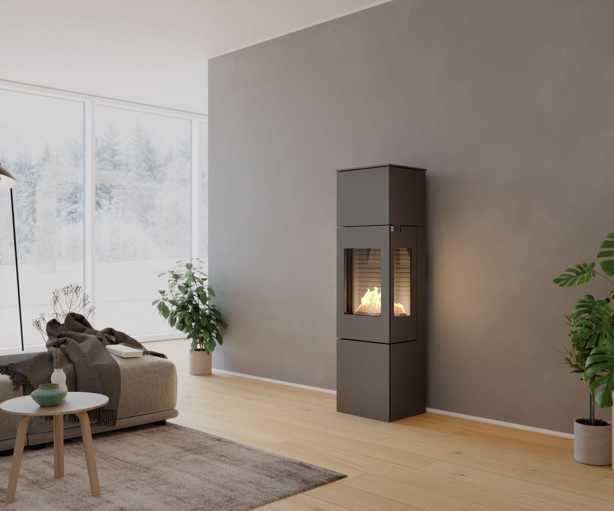 Rais Nexo 160 Bio tall bio stove in grey in a Scandinavian-style living room