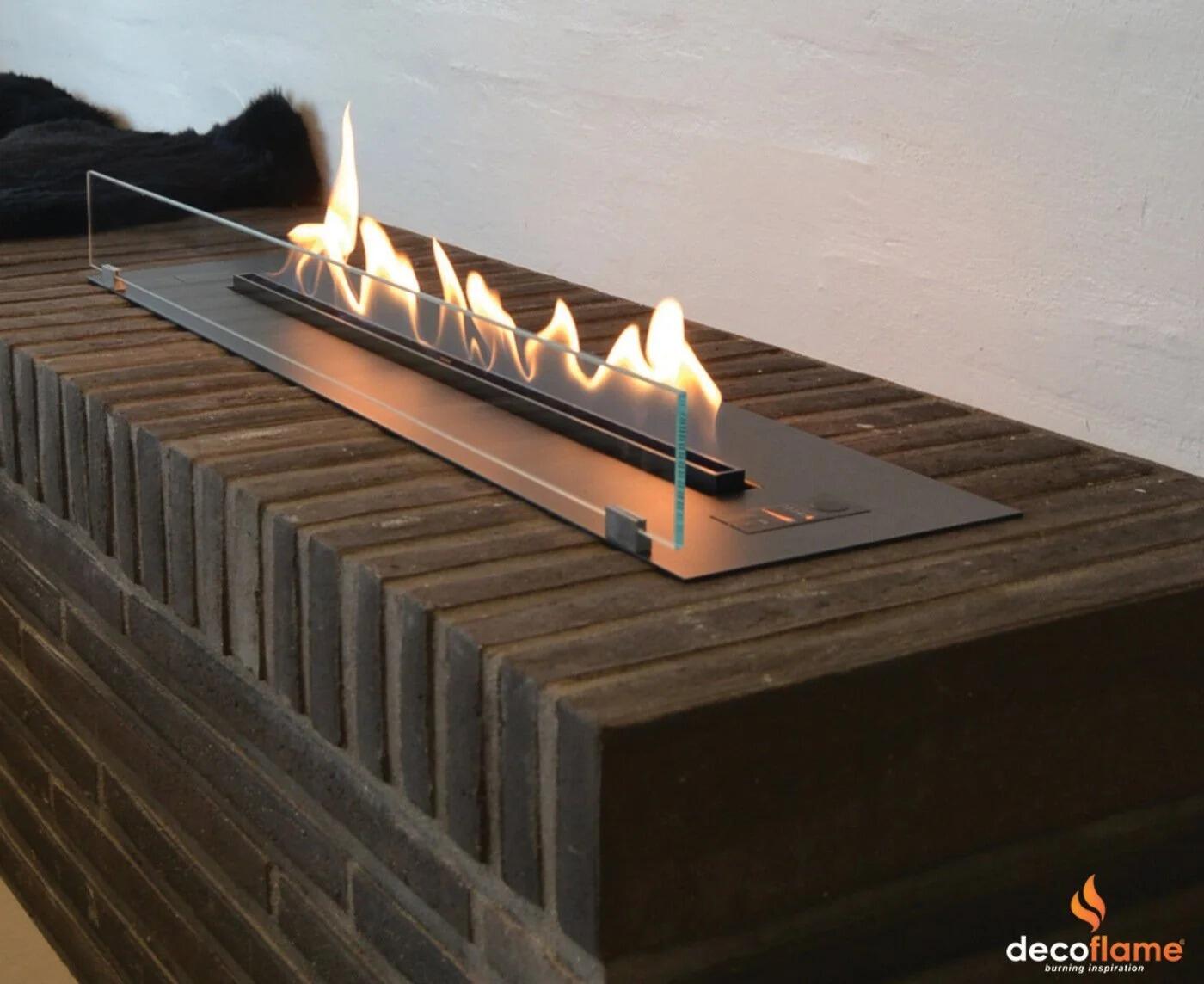 Denver F3 burner with glass screen fitted into a dark brick-effect bench