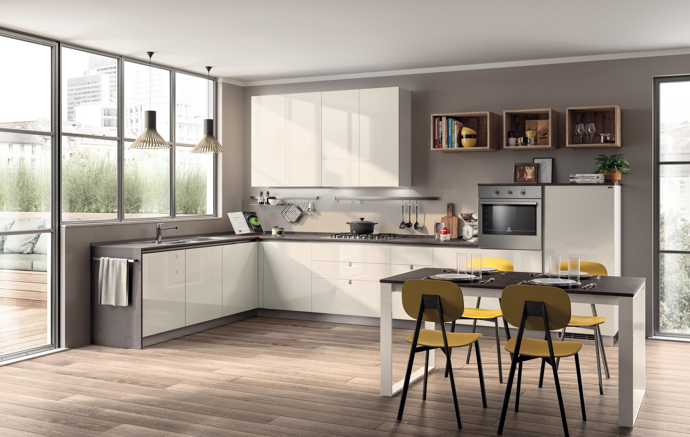 Scavolini Urban L-shaped kitchen in white with a dining table and yellow chairs