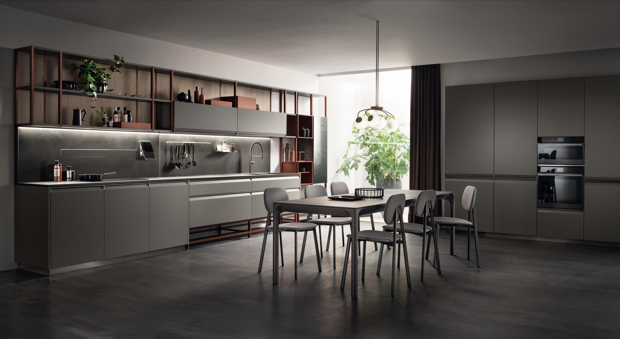 Scavolini Formalia kitchen in grey with a long wall run, open shelves and a dining table