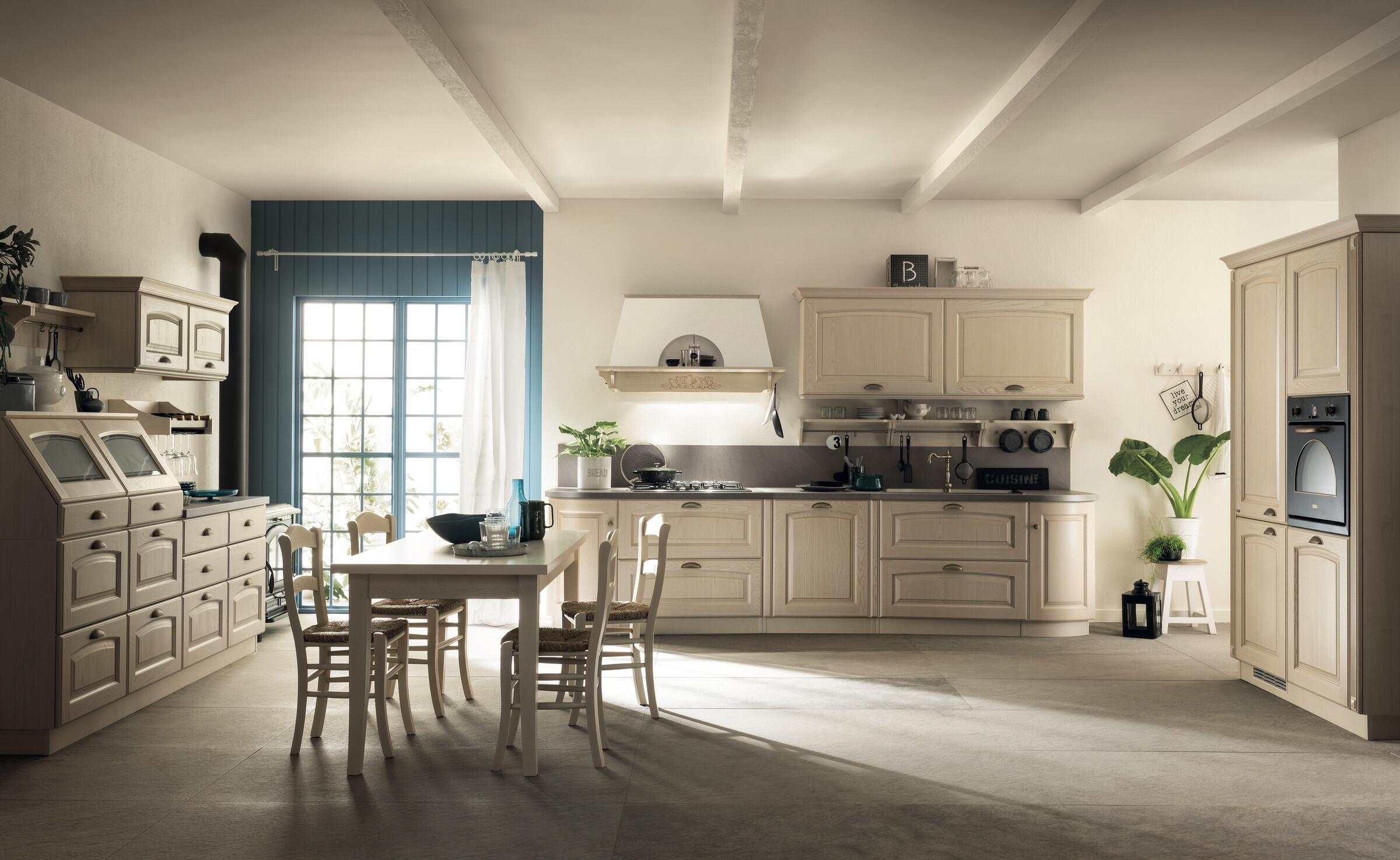 Scavolini Madeleine country kitchen in cream with a dresser and farmhouse dining table