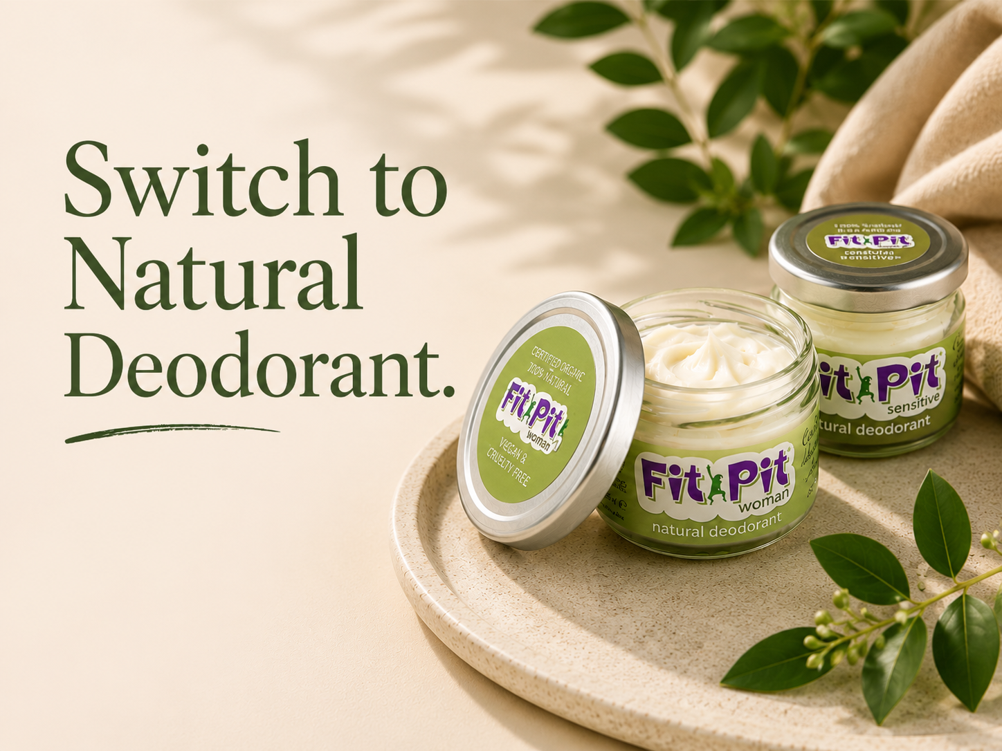 Fit Pit certified organic natural deodorant creams displayed with botanical styling. Banner text reads ‘Natural Deodorant?’ and highlights long-lasting odour protection without aluminium salts.