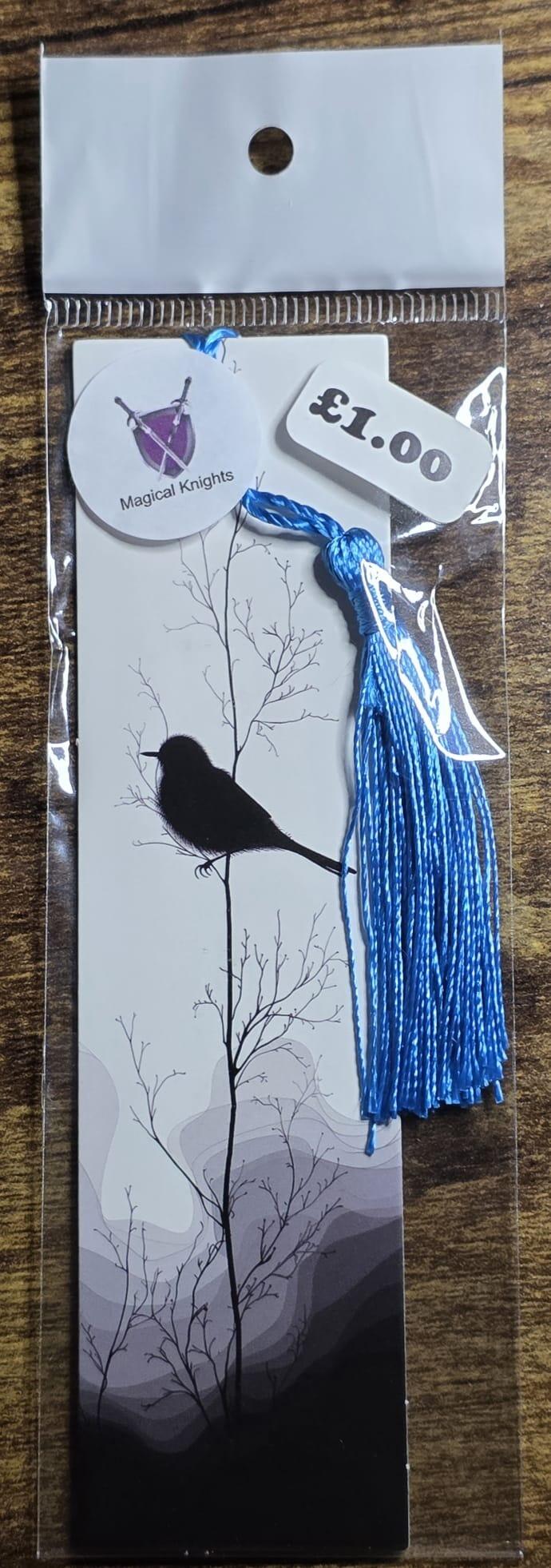 black bird bookmark with blue tassel