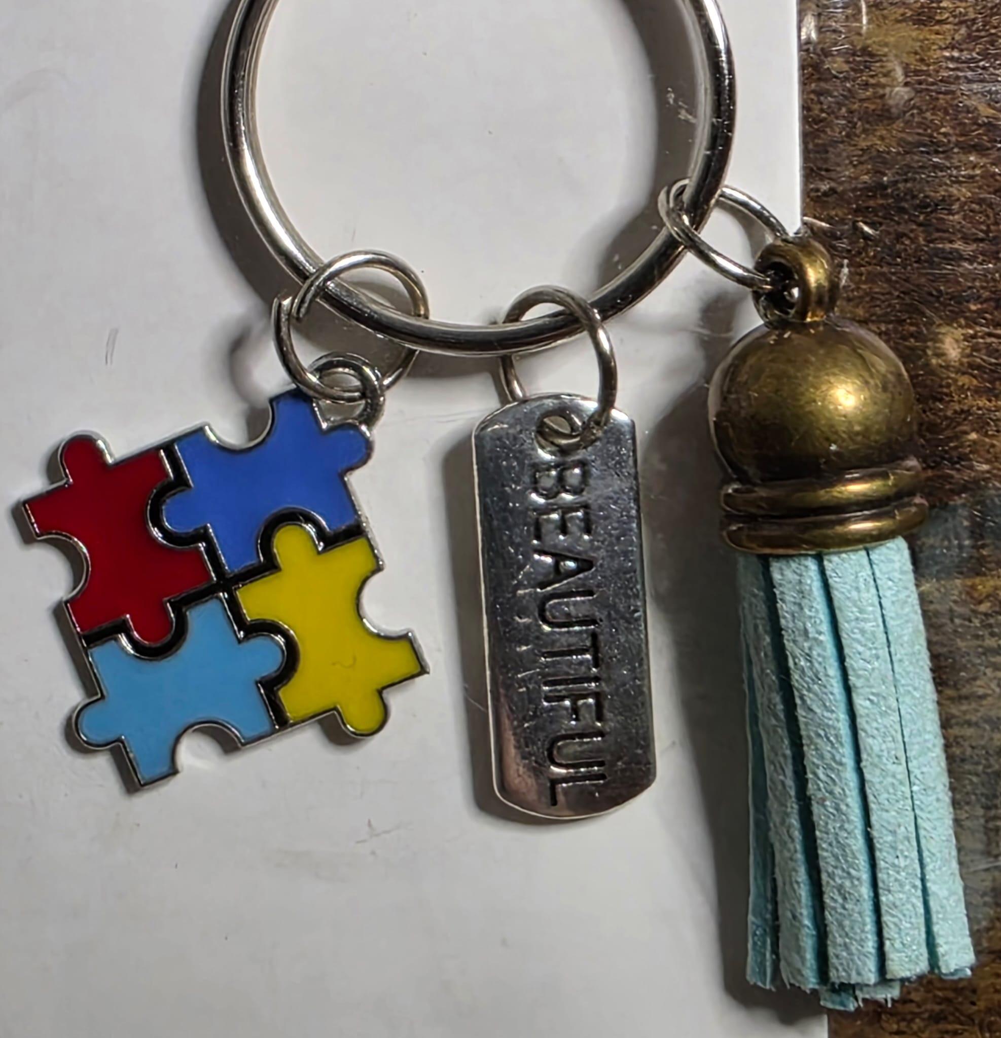 close up autism awareness beautiful teal tassel