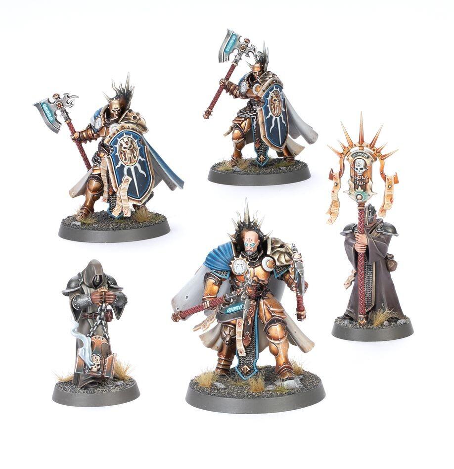 Painted Reclusians with stormspears and ornate shields