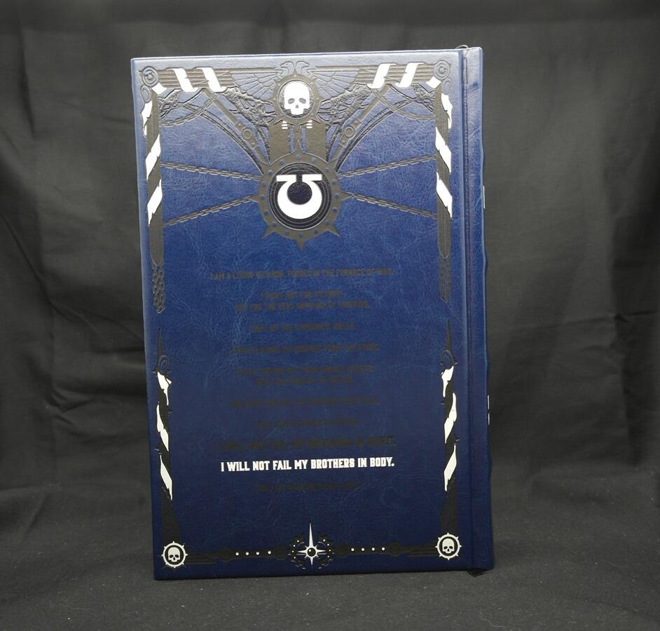 Back cover and quote from book – rear photo