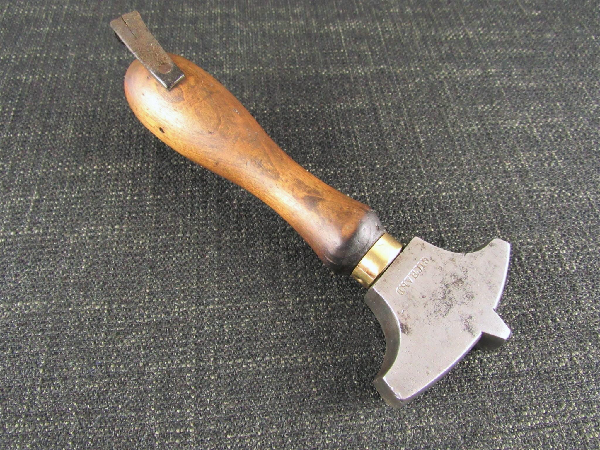 Unusual Shoe Makers Glazing Iron by RICHARD