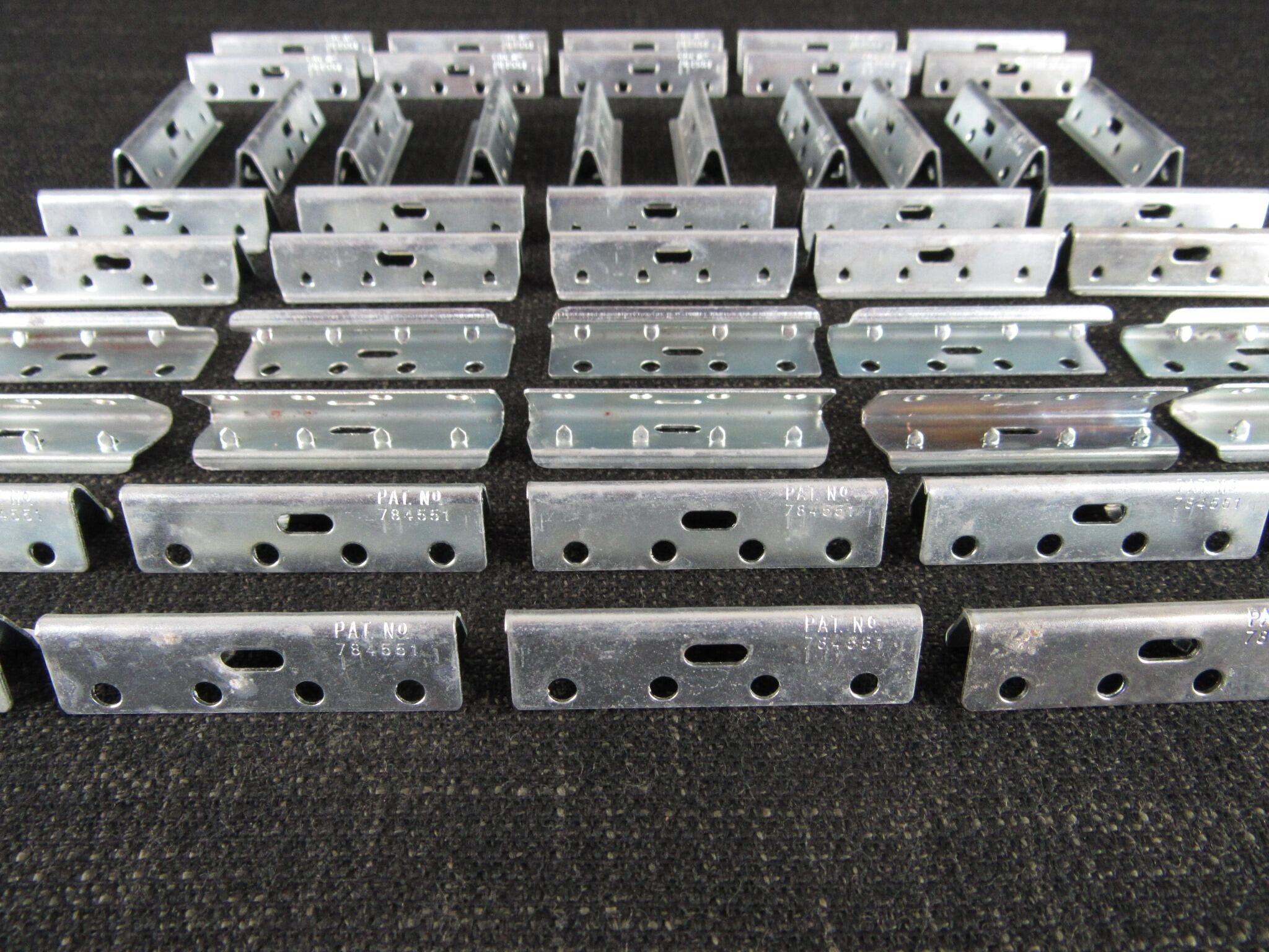 50 x 50mm PIRELLI Webbing Clips with Patent Number - New Old Stock