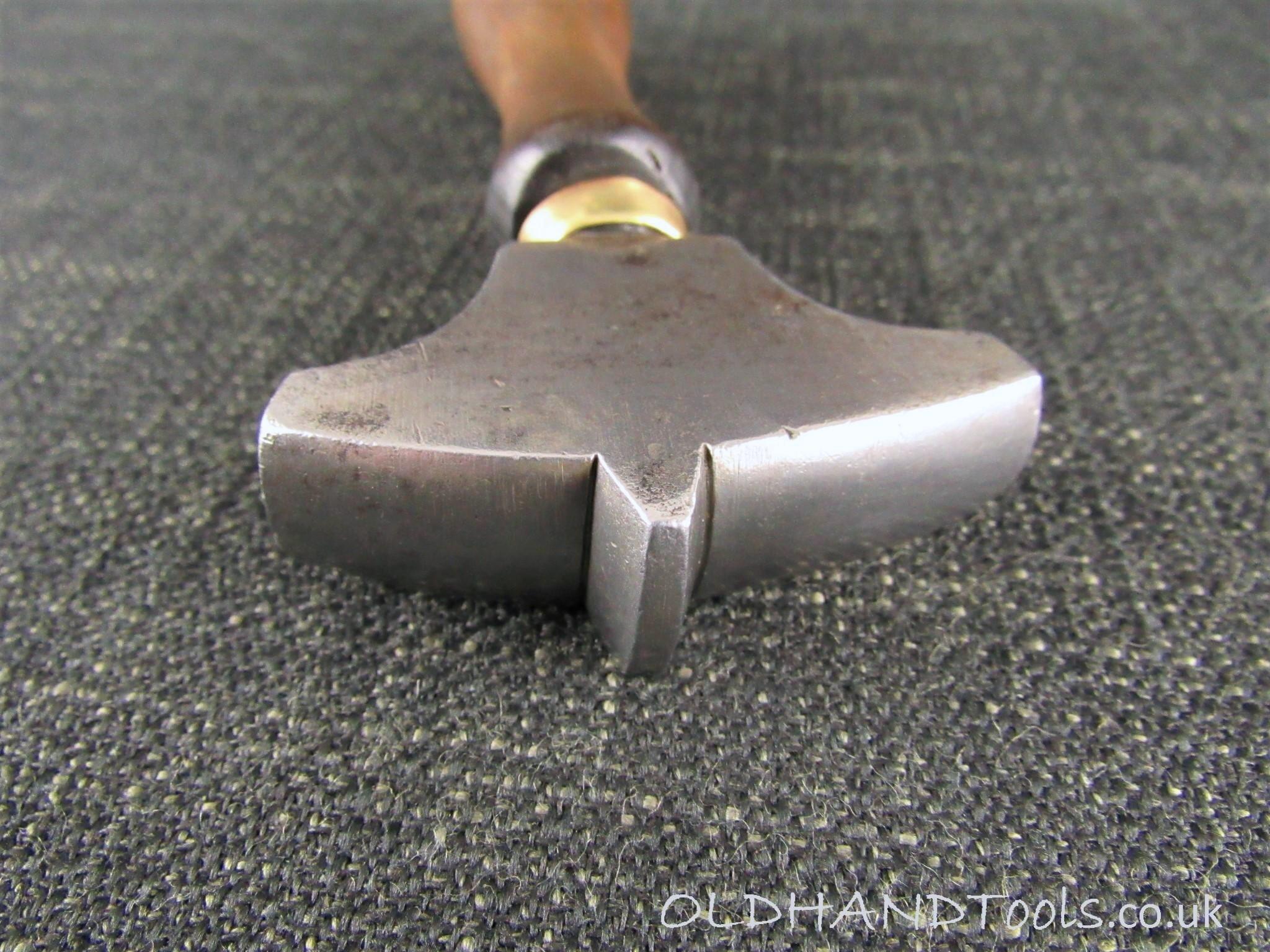 Unusual Shoe Makers Glazing Iron by RICHARD