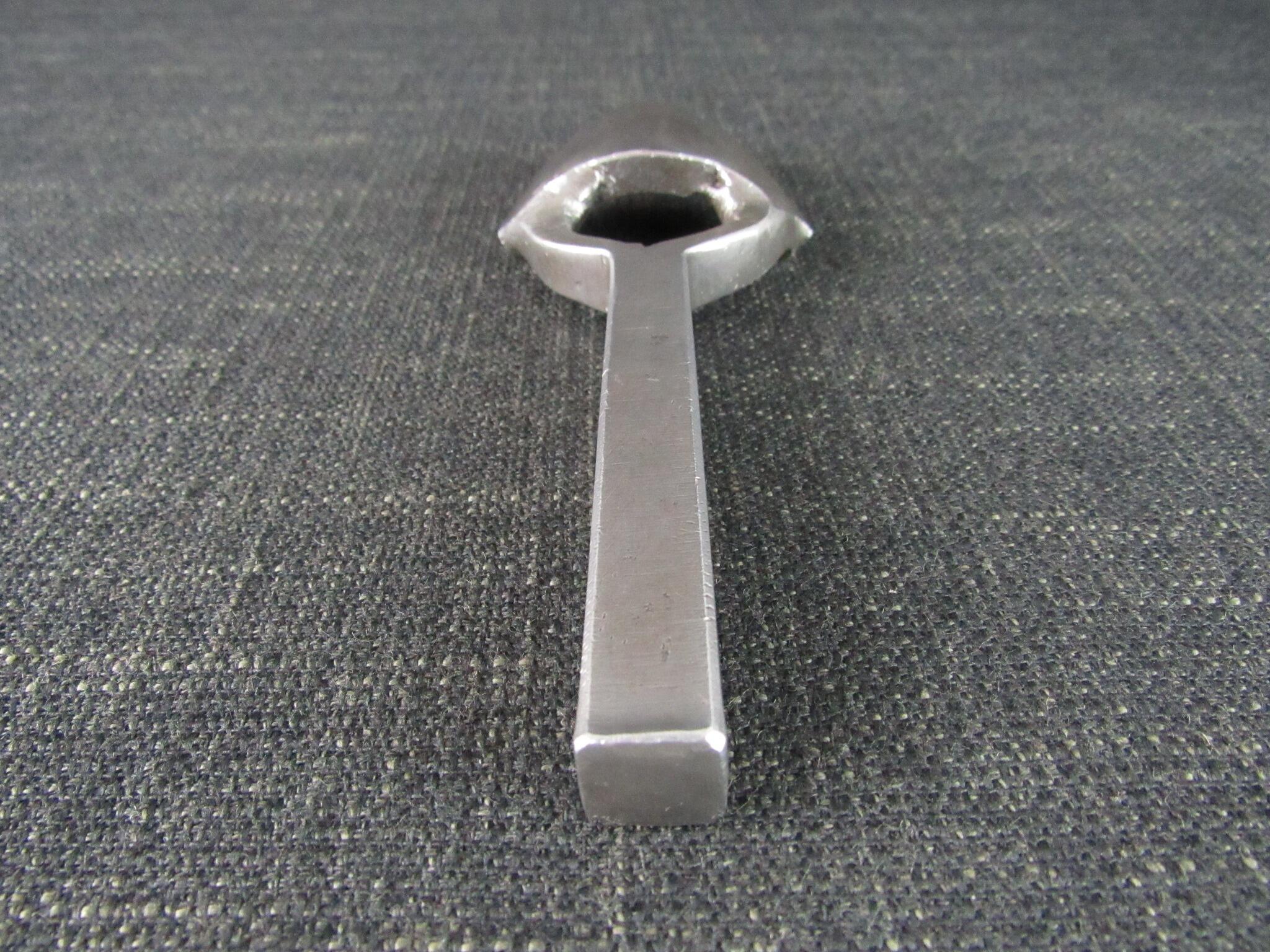 Strap End Punch