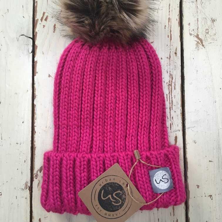 bright pink bobble hat