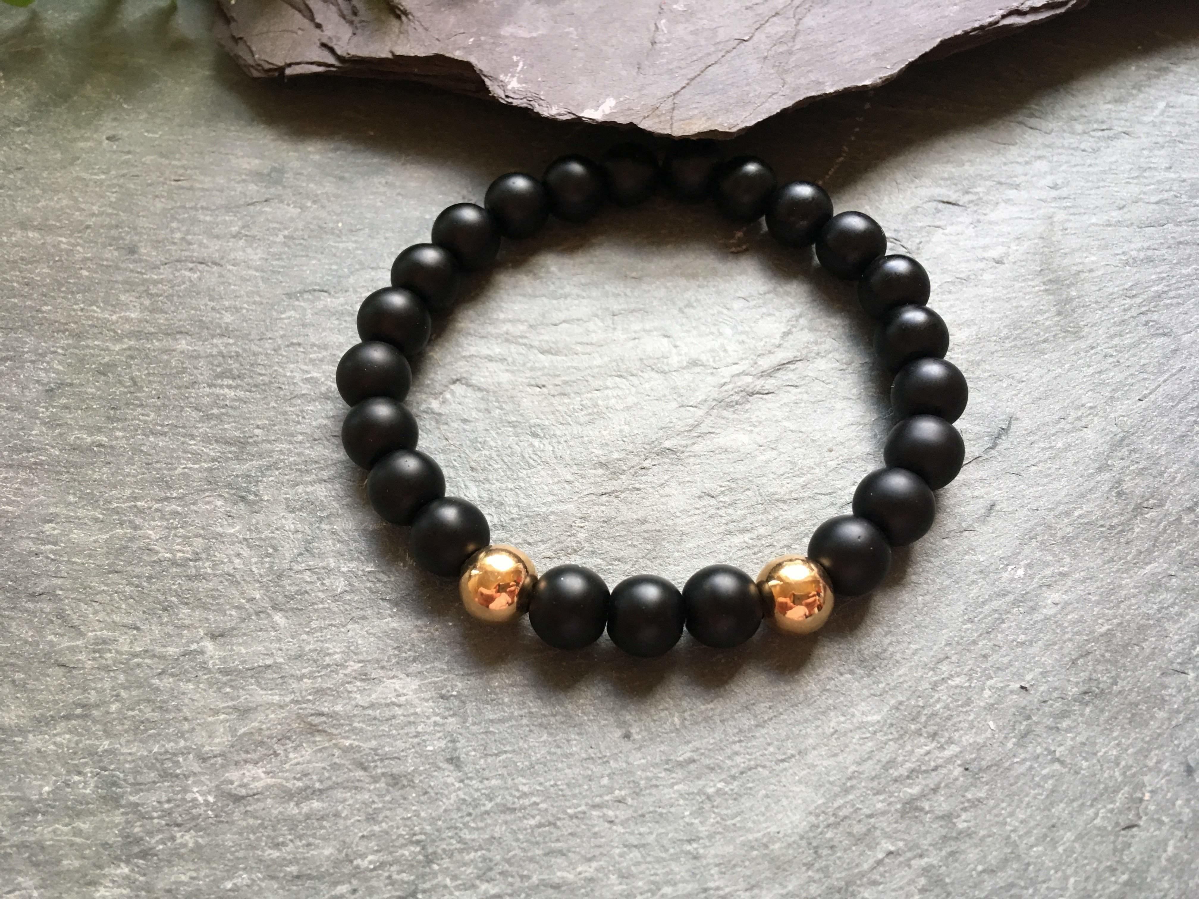 Black And Gold Stylish Bead Bracelet 2 Rose Coloured Metal Beads Black And Gold Stylish Bead Bracelet 2 Rose Coloured Metal Beads Liv