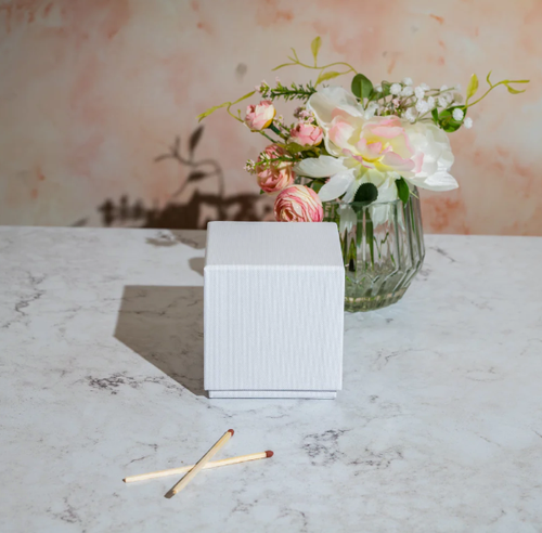 White Luxury Gift Box For Refillable Glass Candle Jars in studio setting