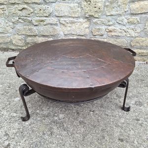 Fire Bowl Lid On A Fire Bowl From The Side