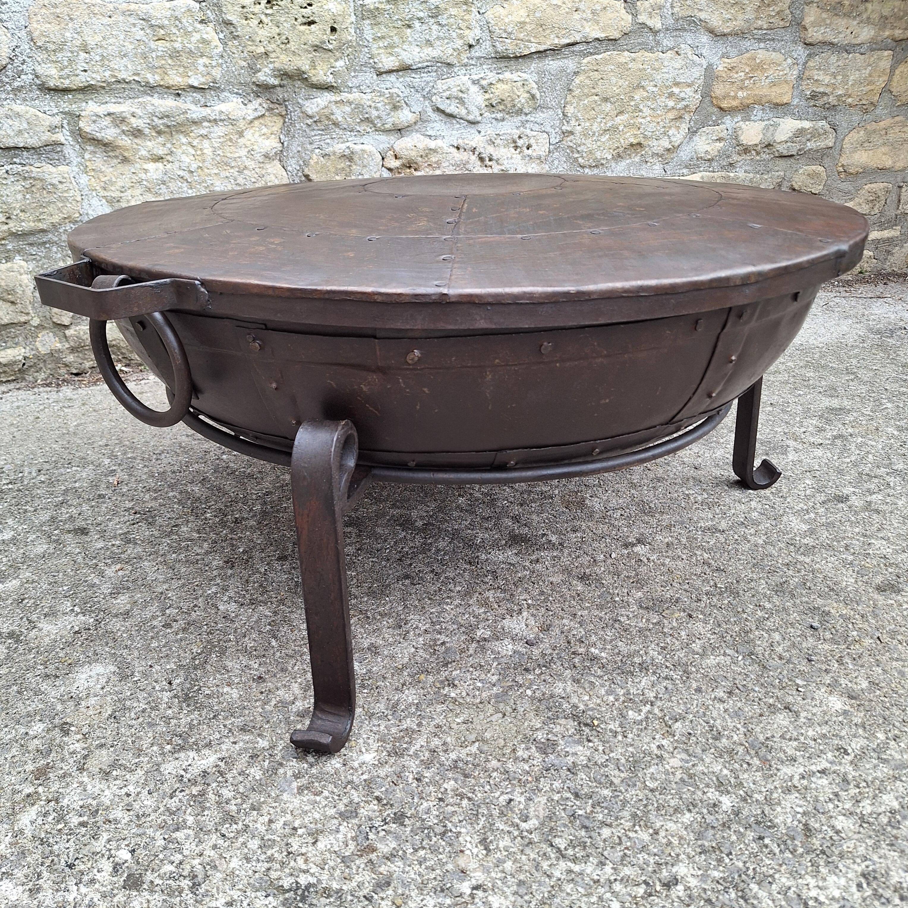 Fire Bowl Lid On A Fire Bowl From The Side