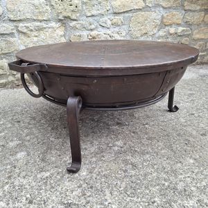 Fire Bowl Lid On A Fire Bowl From The Side