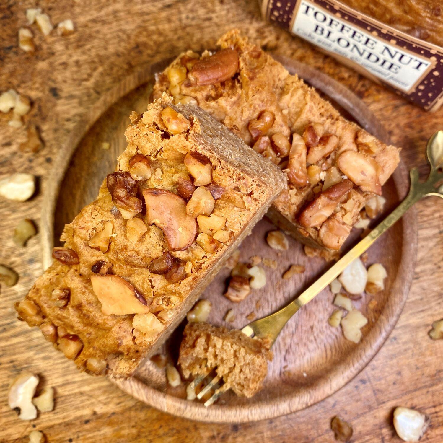 Toffee Nut Blondie which is a golden blondie square slice, generously topped with baked, crunchy cashews and walnuts. A delicious nutty blondie from Botham's iconic Whitby bakery.