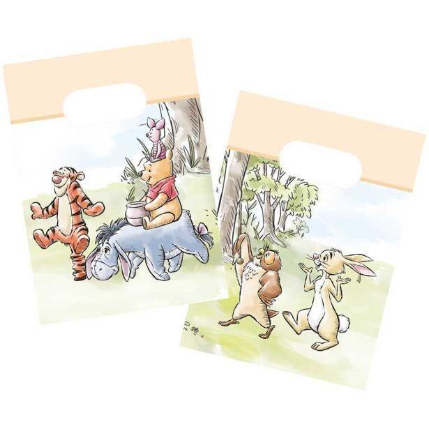 A pack of 4 paper party bags featuring Winnie the Pooh and his friends displayed on both sides of the party bag