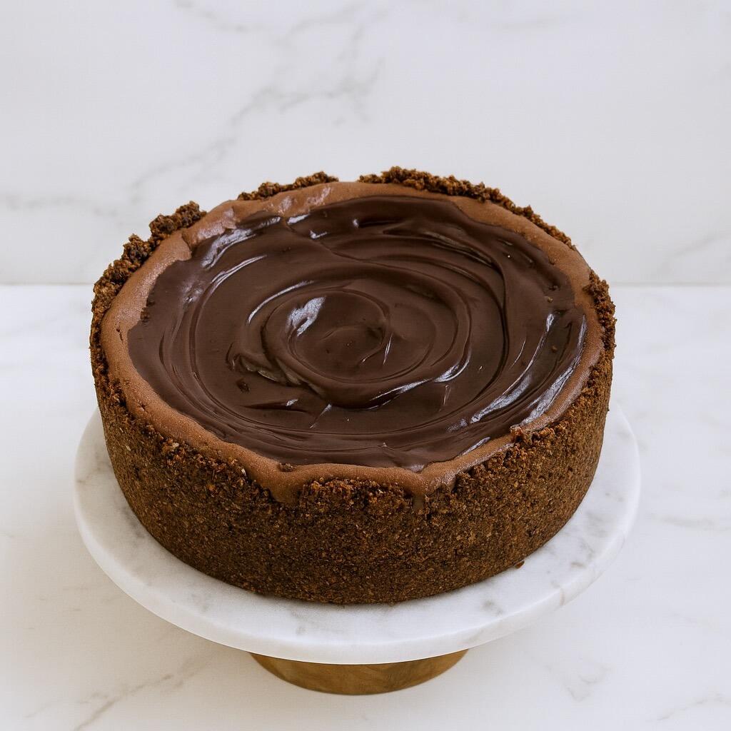 Malt chocolate cheesecake close up, ganache finish