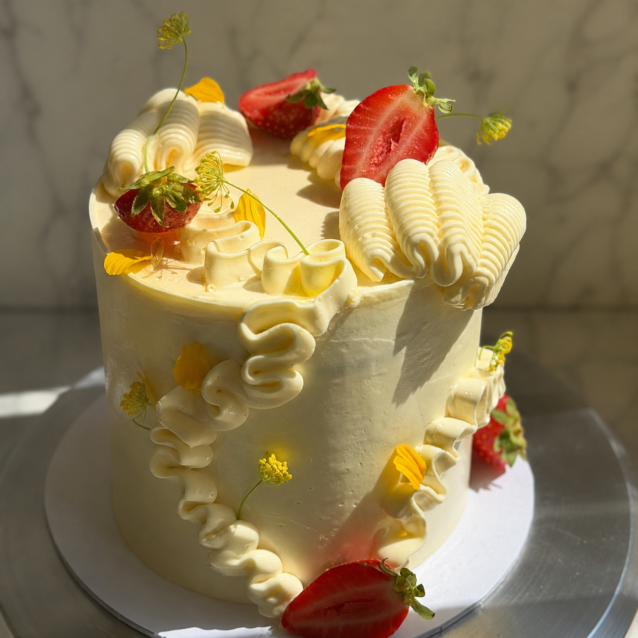 Olive oil cake with yoghurt Swiss meringue, close up
