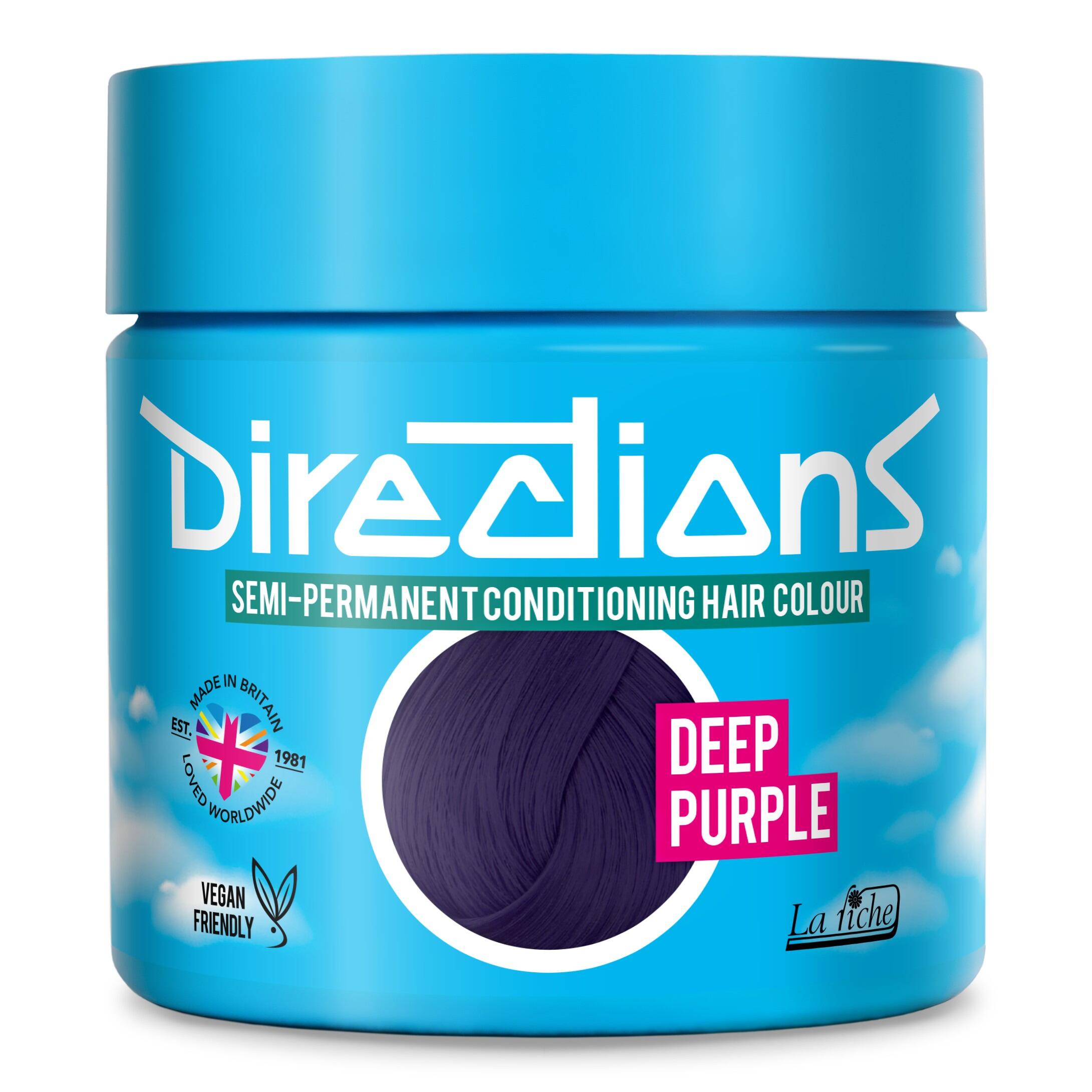 Picture of new directions hair dye pot on white background. Screw top pot with deep purple directions colour inside