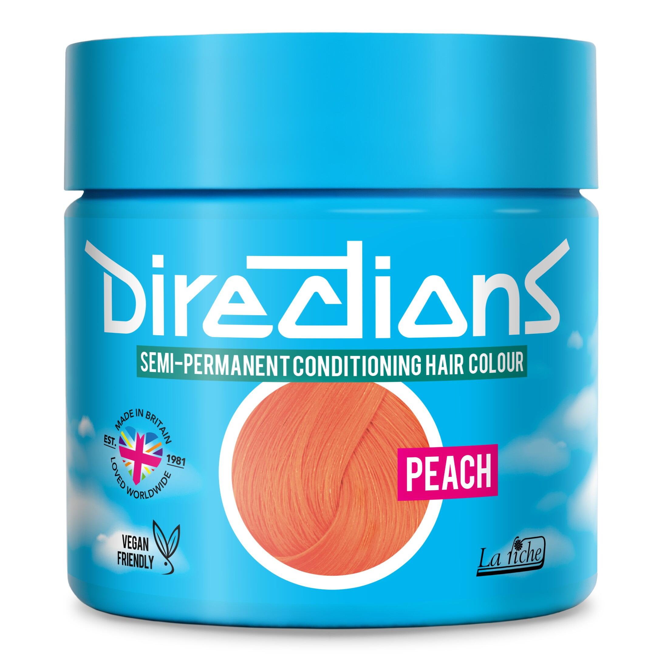 Picture of new directions hair dye pot on white background. Screw top pot with peach directions colour inside