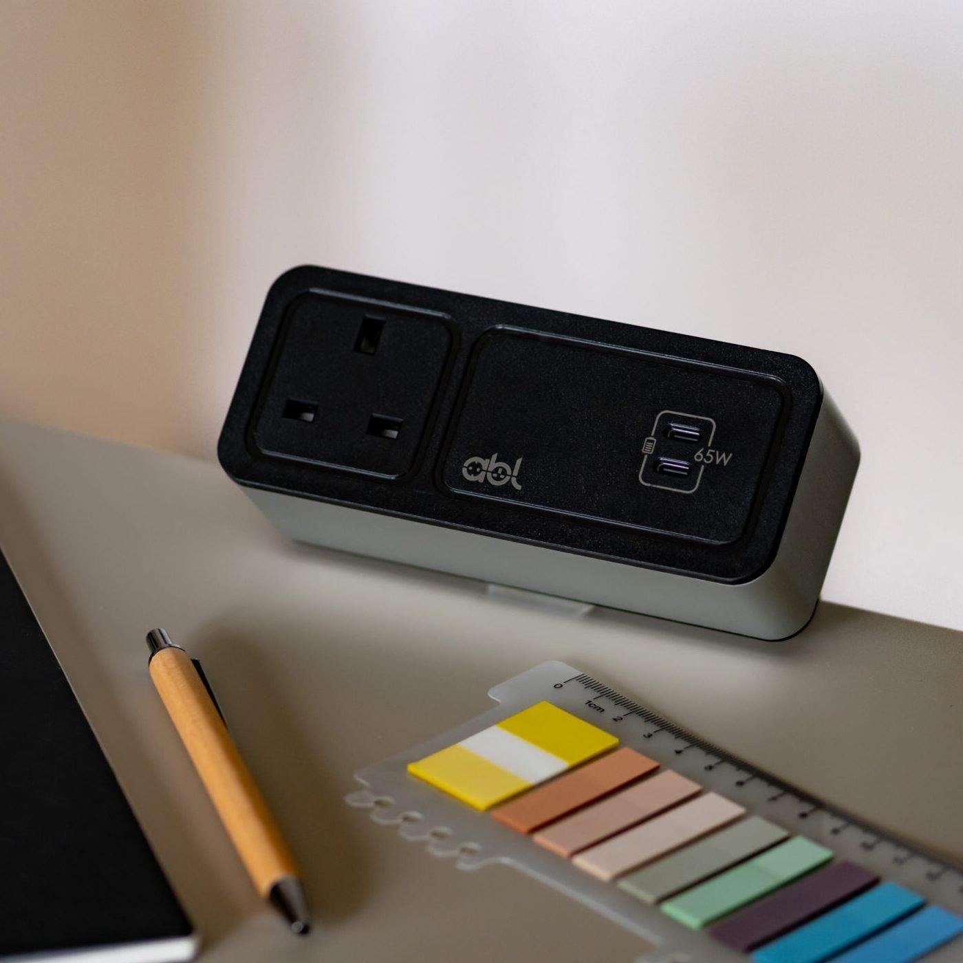 Axis65 Desktop Power Module in Black and Silver with USB C+C 65 Watt Charging from Aerofoil