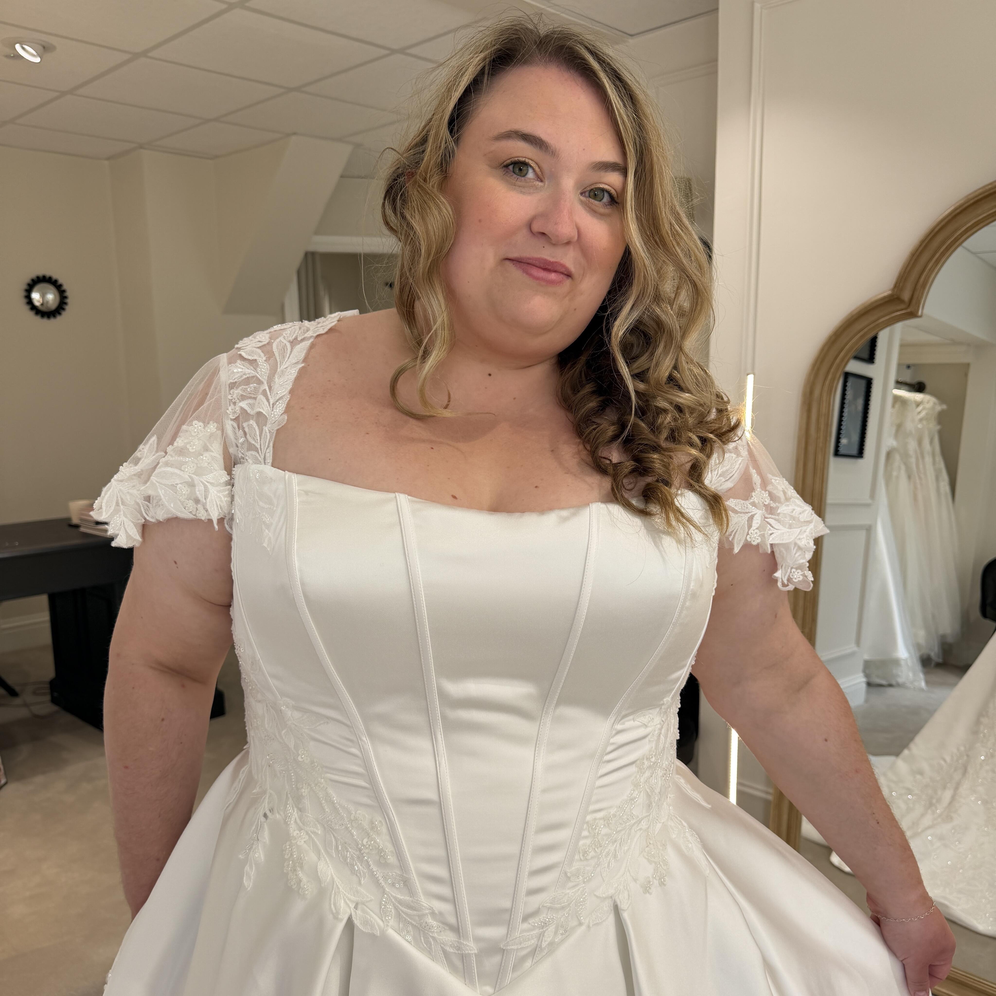 Basque waist plus size wedding dress