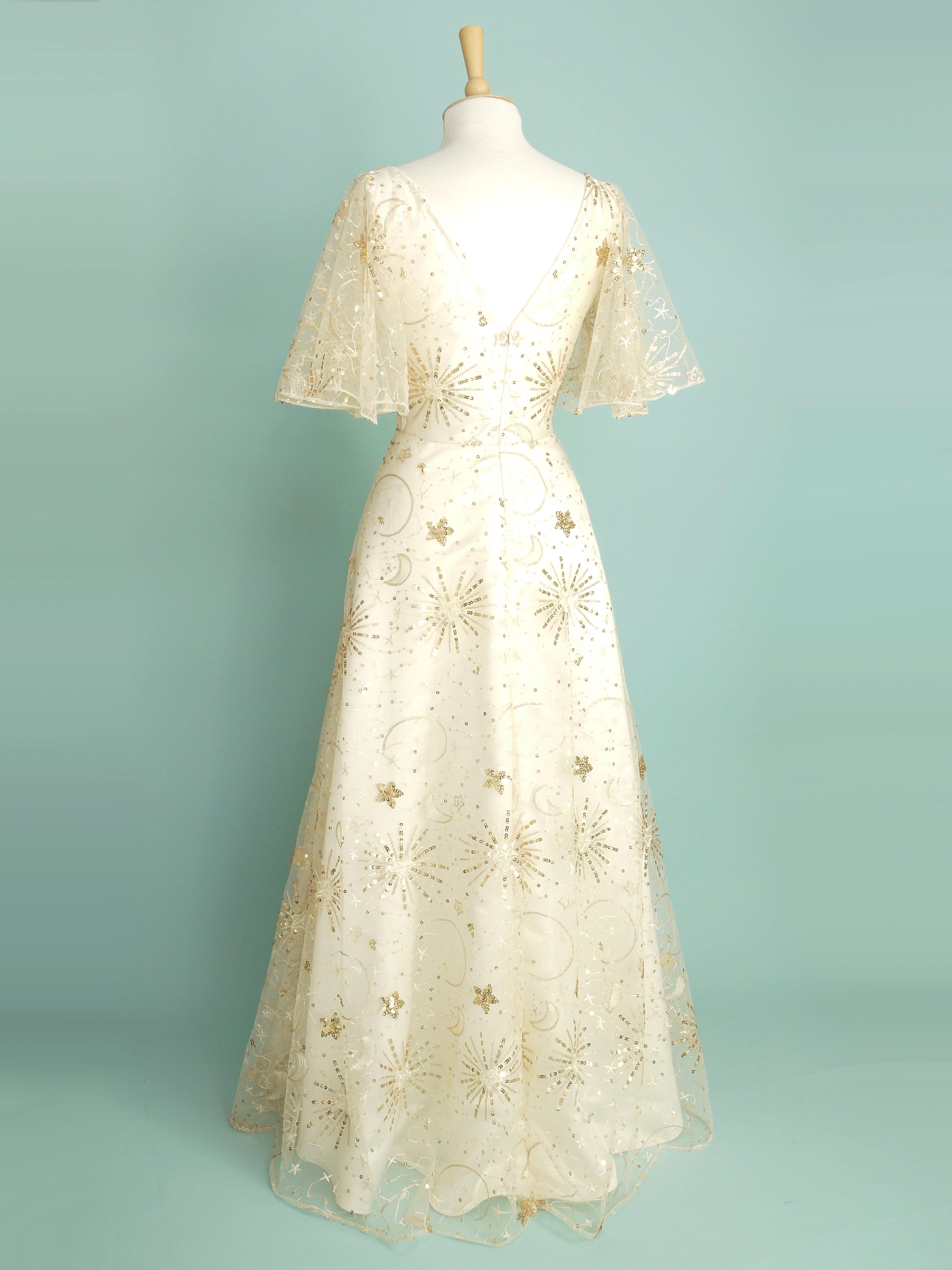 Wedding dress made in gold sparkly celestial lace over ivory duchess satin