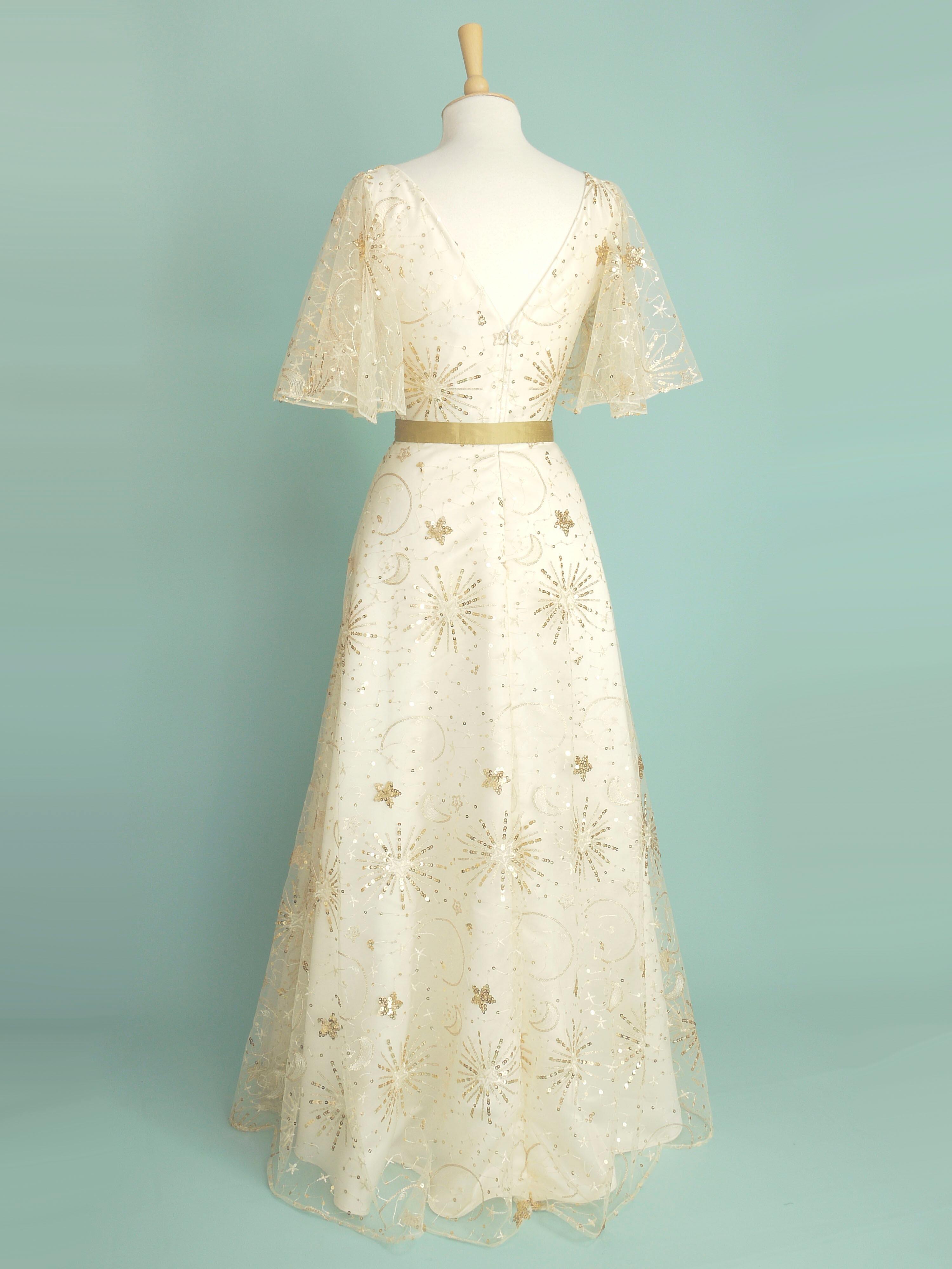 Wedding dress made in gold sparkly celestial lace over ivory duchess satin