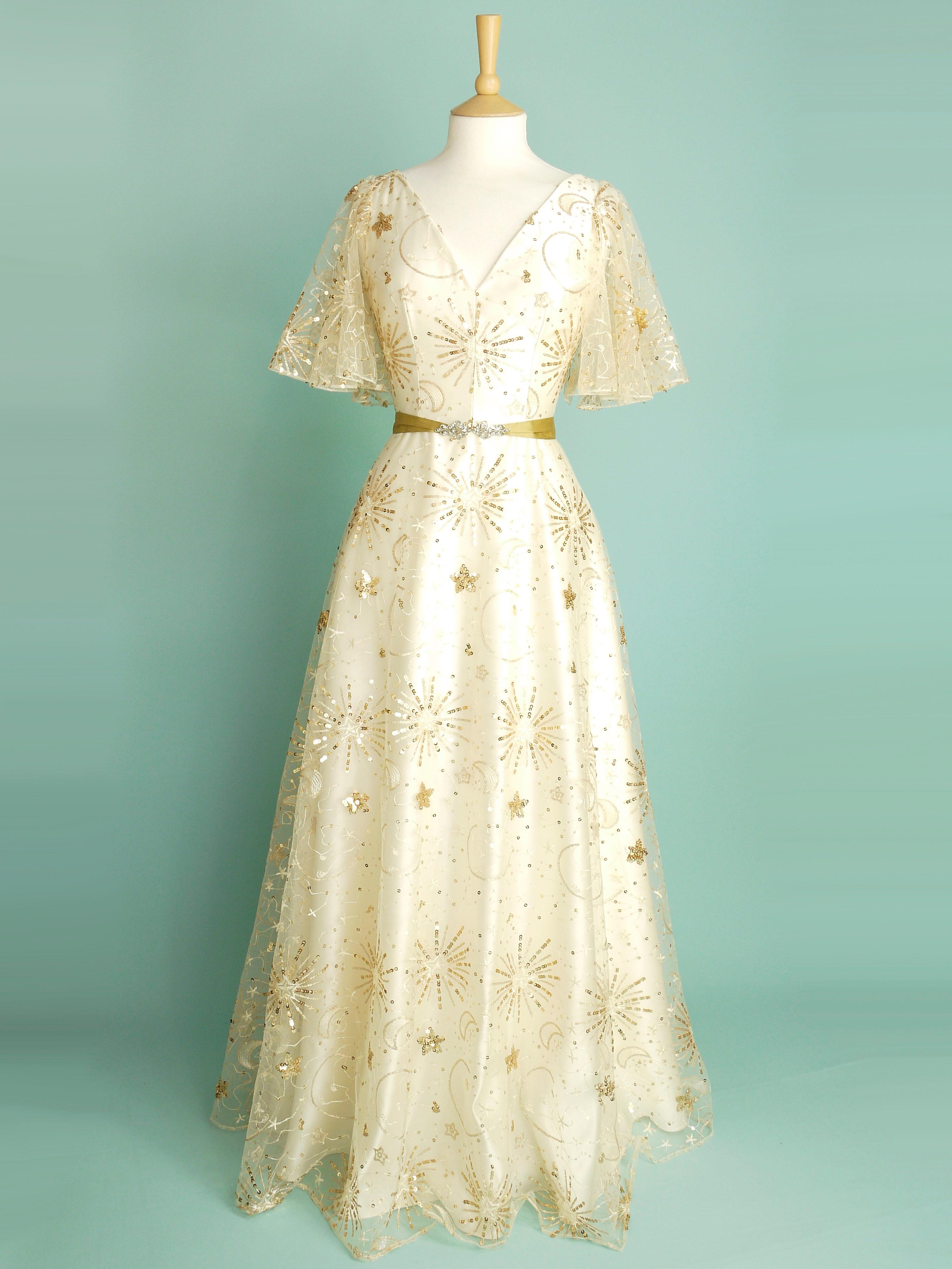 Wedding dress made in gold sparkly celestial lace over ivory duchess satin