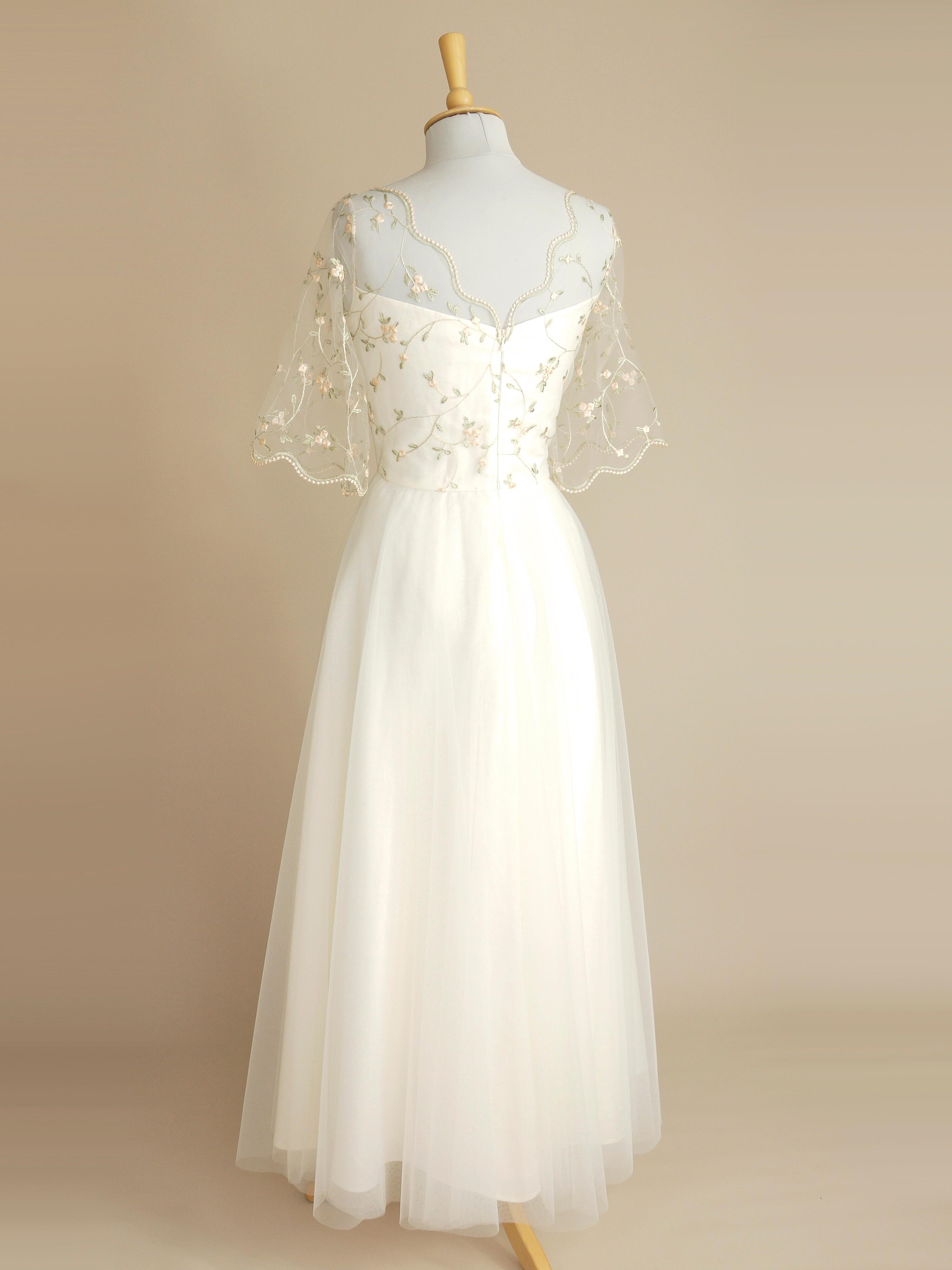 the back view of the blossom wedding dress
