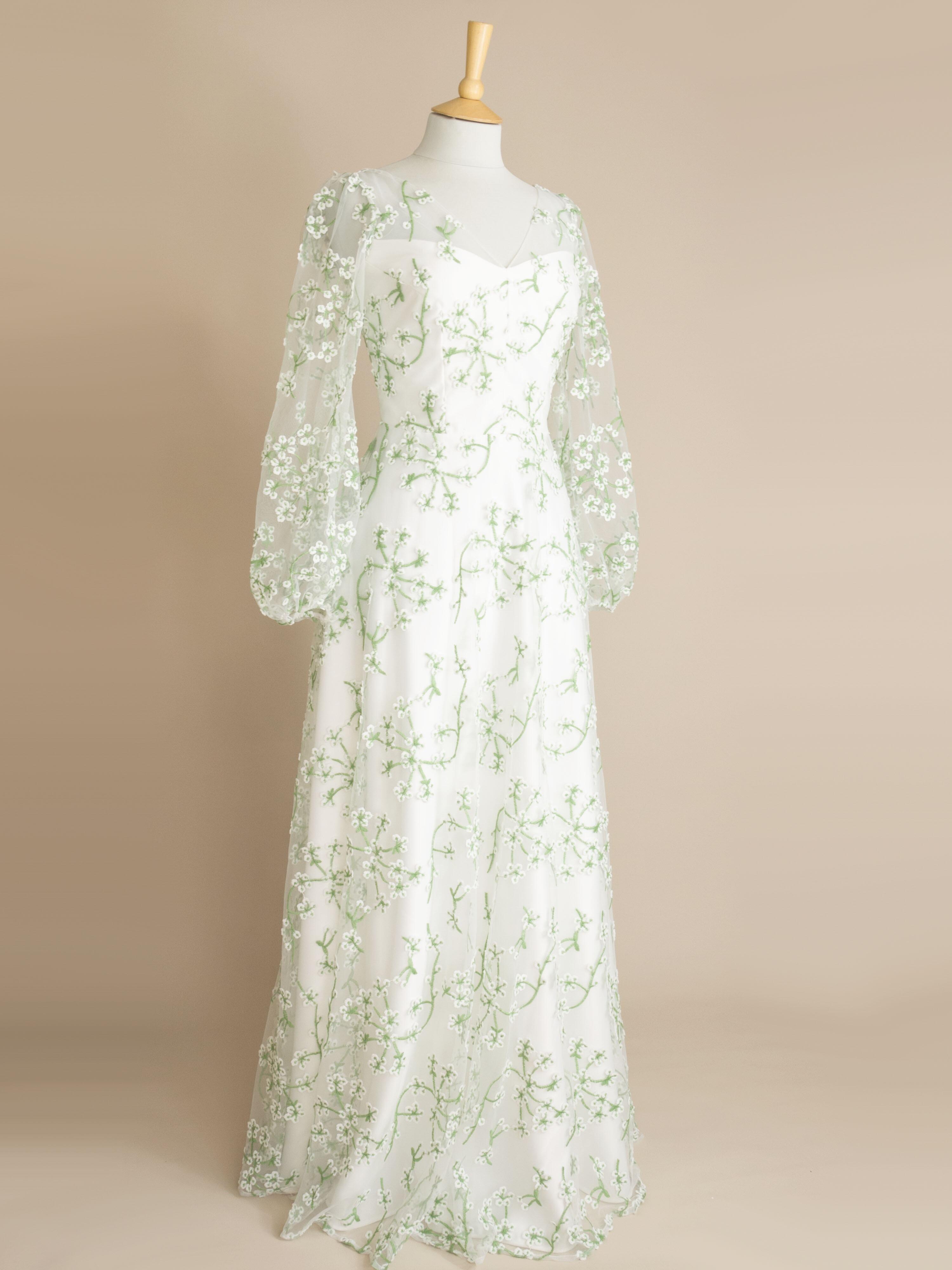 a side view of the Jasmine green floral lace wedding dress