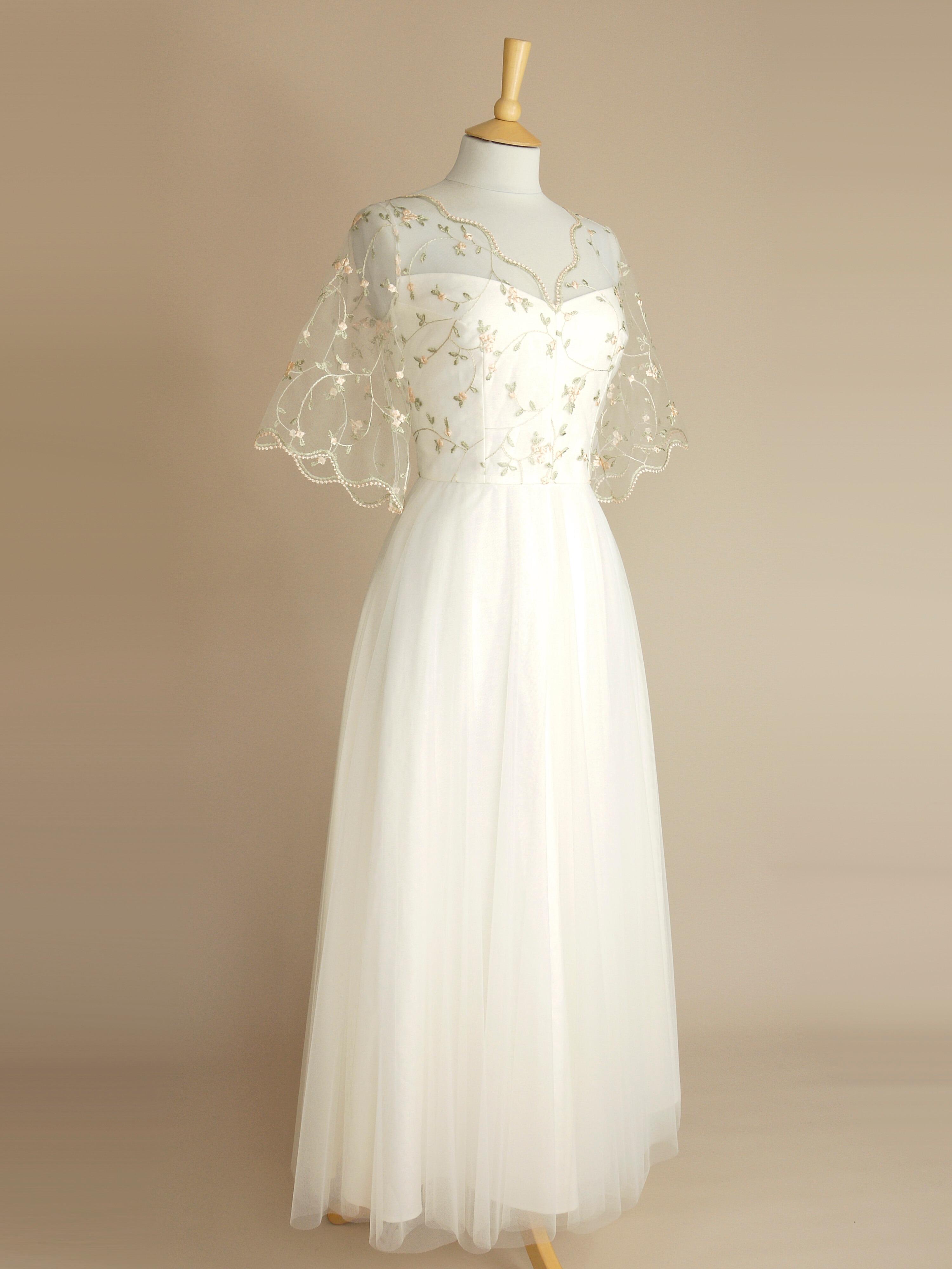 a side view of the blossom wedding dress