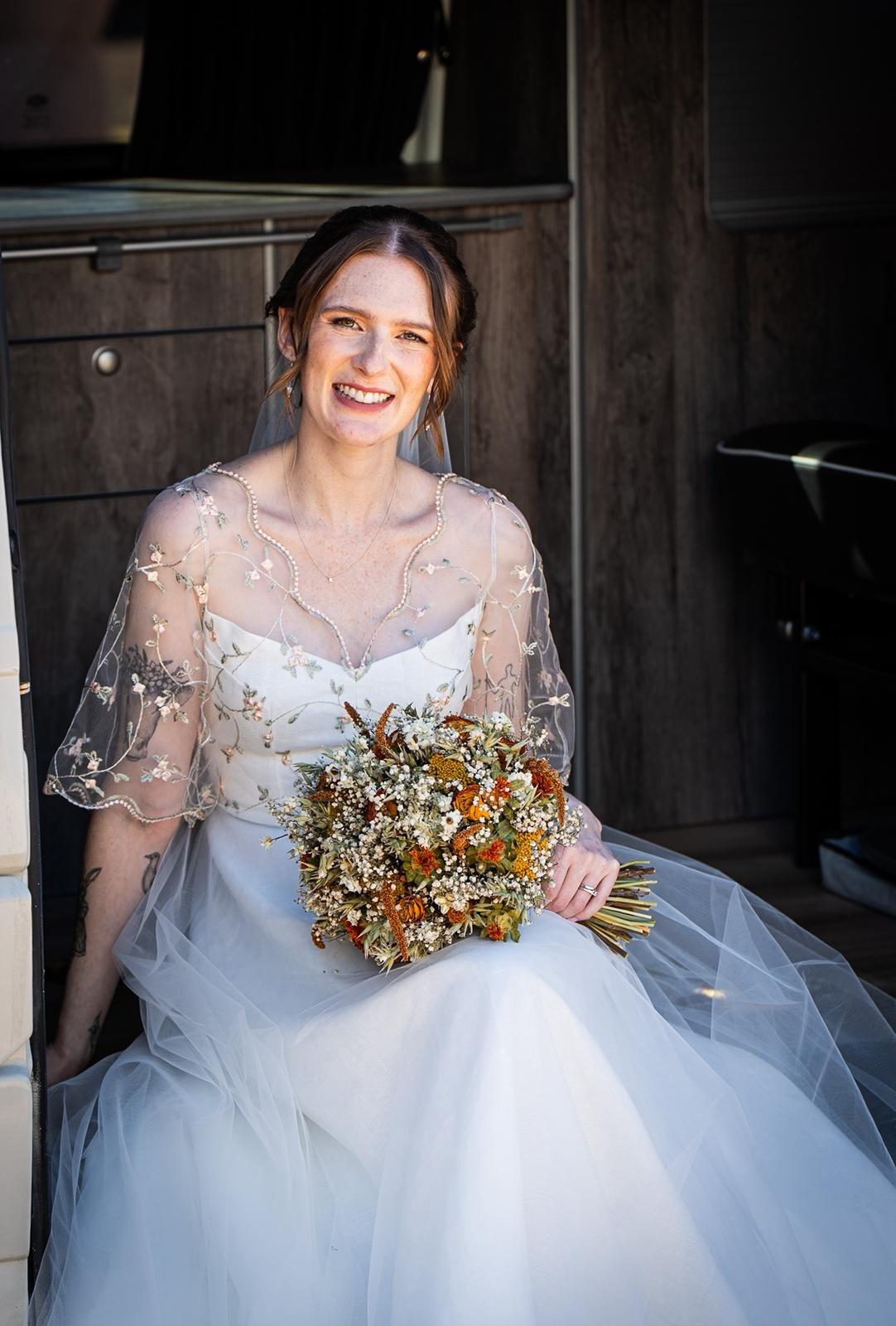 a beautiful real bride wearing the blossom wedding dress