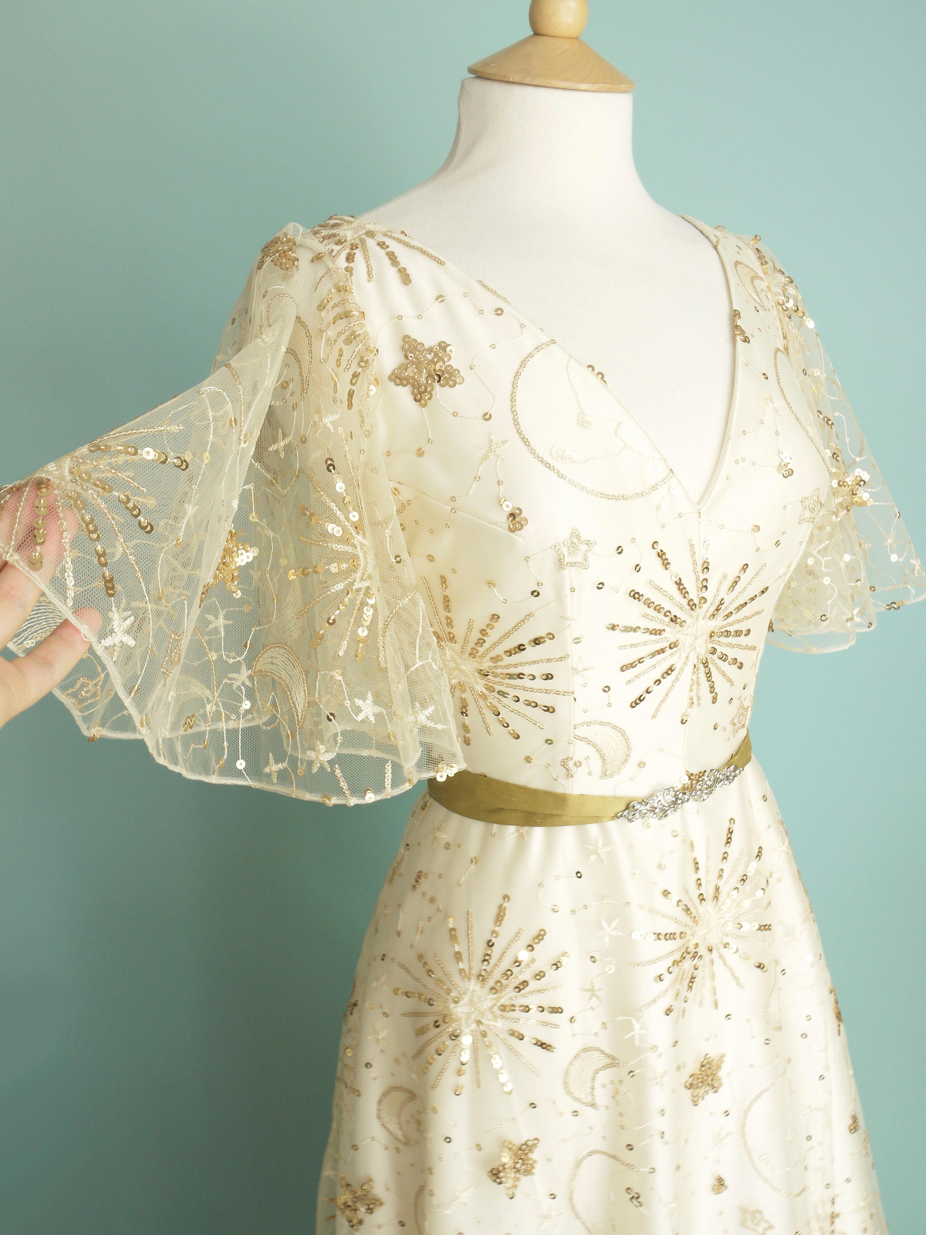 Wedding dress made in gold sparkly celestial lace over ivory duchess satin