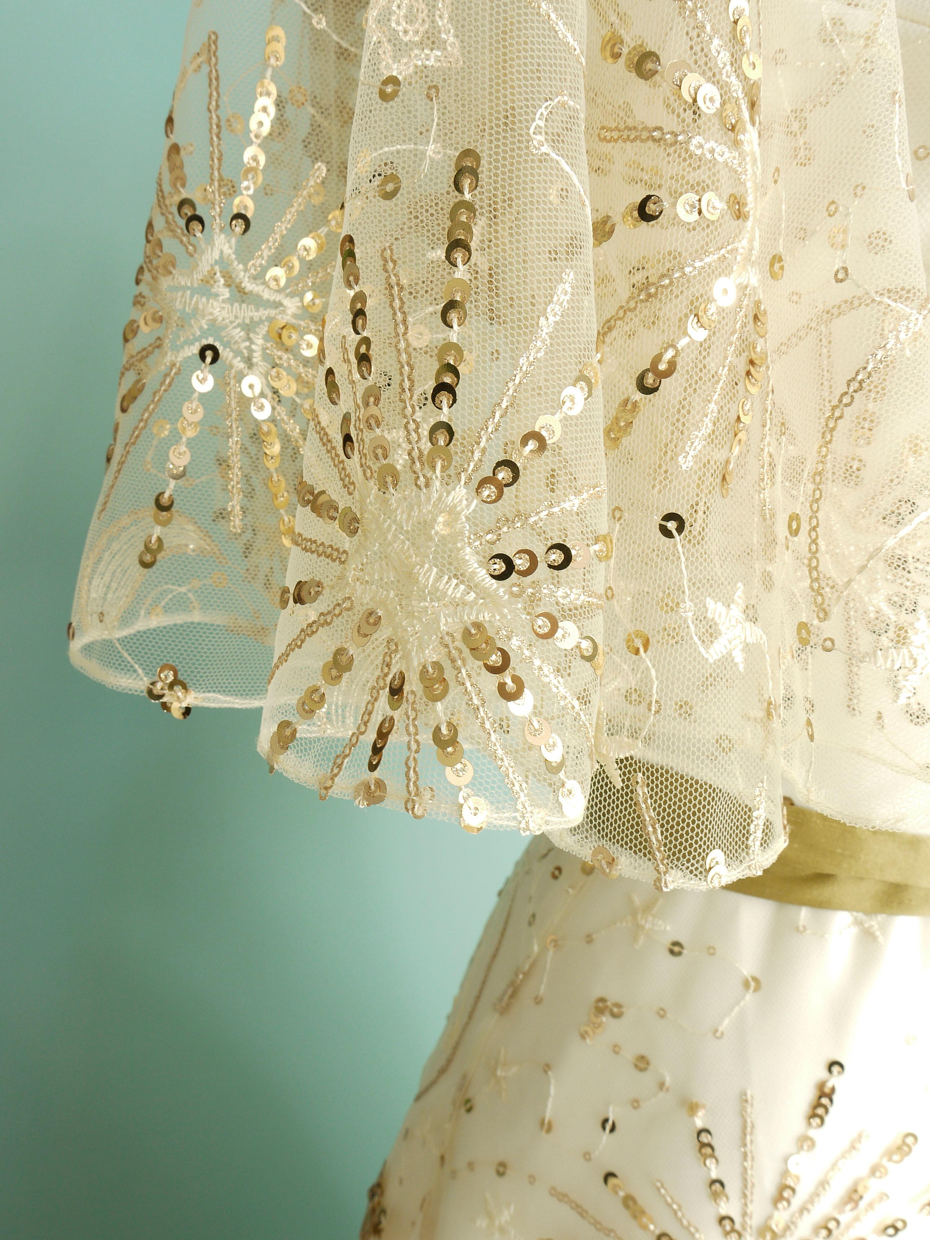 Wedding dress made in gold sparkly celestial lace over ivory duchess satin