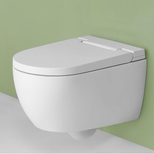 Geberit AquaClean Alba wall hung shower toilet in a greenbathroom