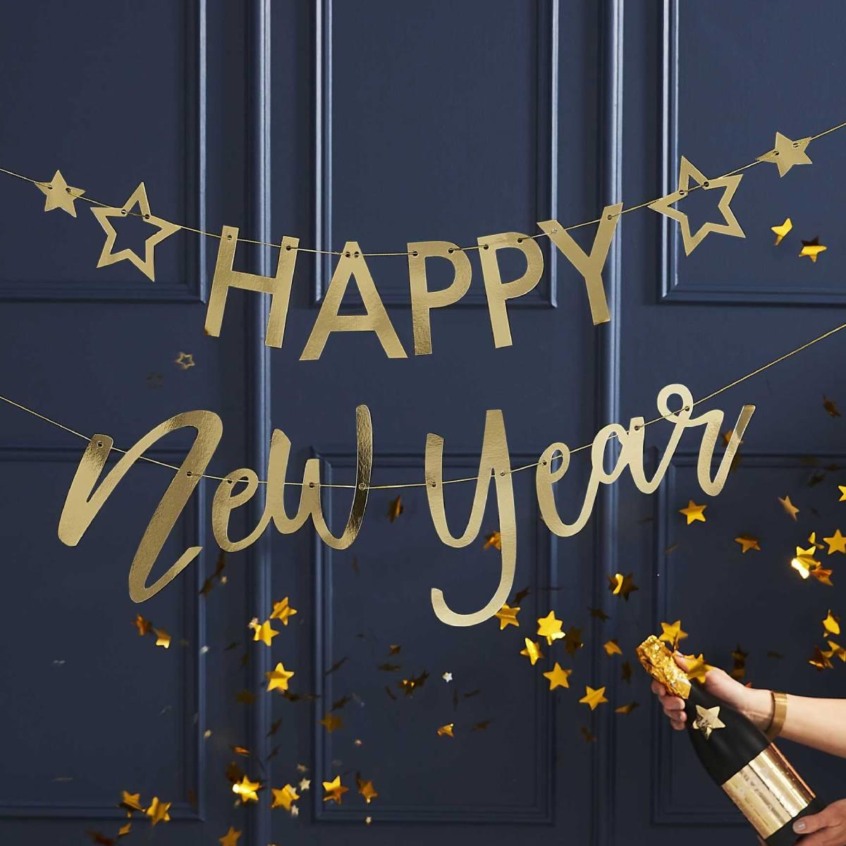 Lifestyle shot of our Happy New Year gold foil banner by Ginger Ray POP-414 available here at Karnival Costumes online party shop