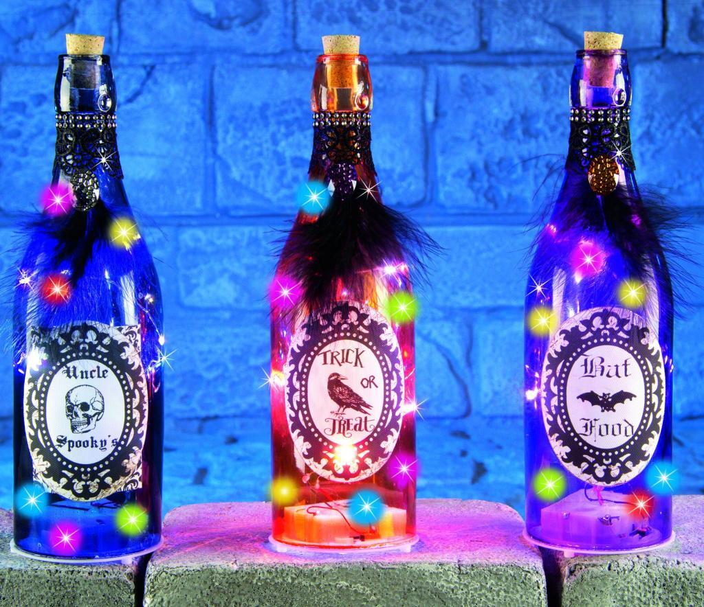 Bottle with LED Lights and Decoration in three designs by Premier Decorations HB159907 and available from Karnival Costumes
