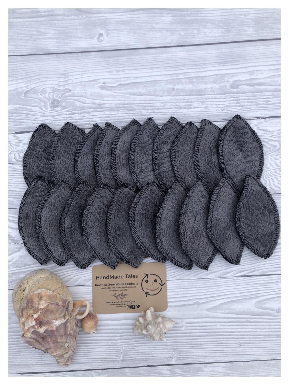 Pack of 20 interlabial pads, dark grey bamboo blend fabric with black fleece backing handmade by HandMade Tales Cornwall, UK
