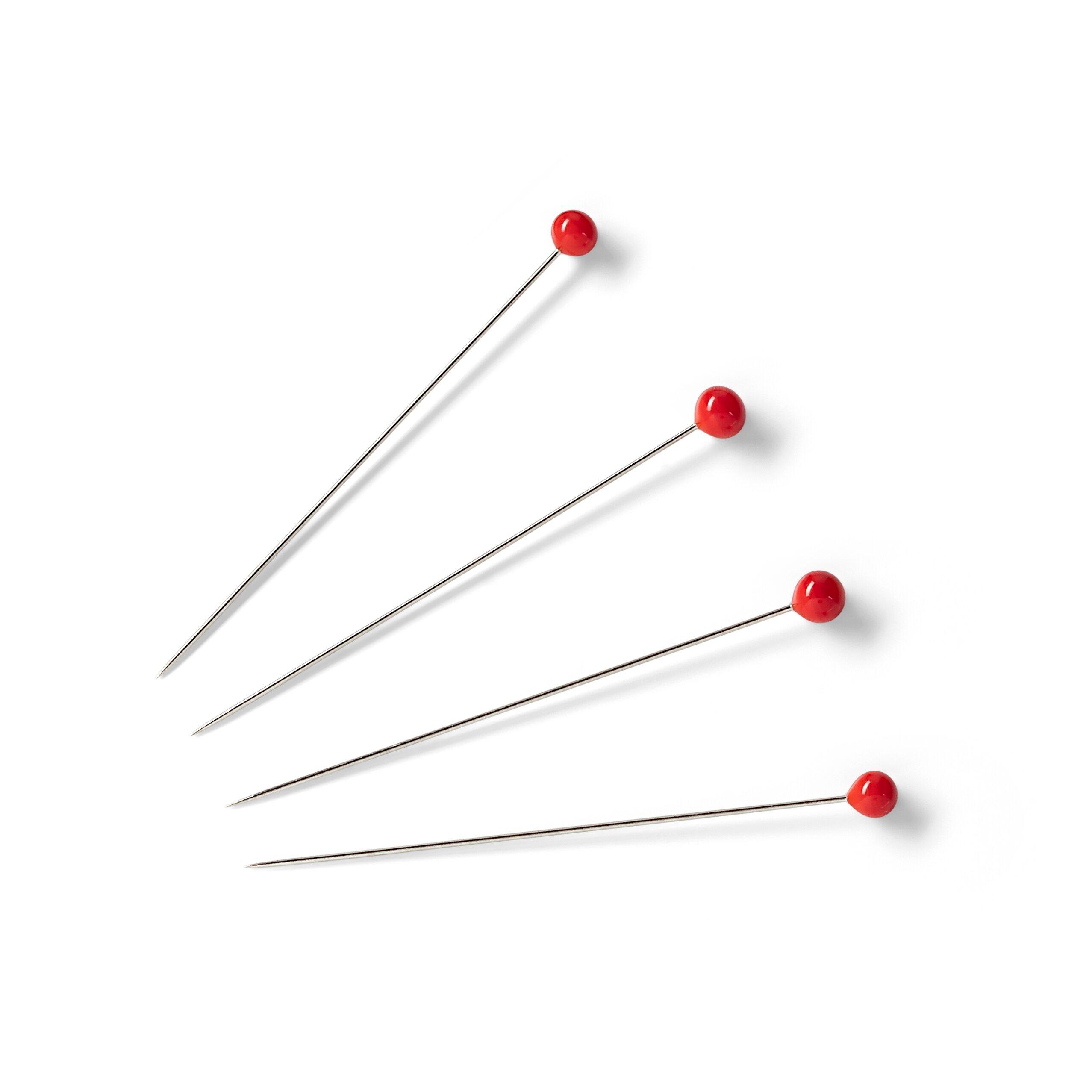 Close look at four of the Prym super fine glass headed pins