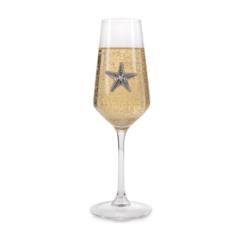 A Champagne Flute with a Pewter Starfish badge on the front, filled with Champagne