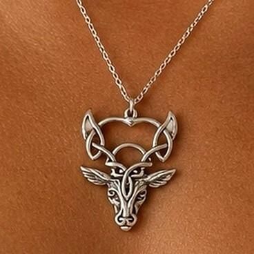Detailed pewter Celtic stag head pendant featuring intricate knotwork antlers on a silver chain